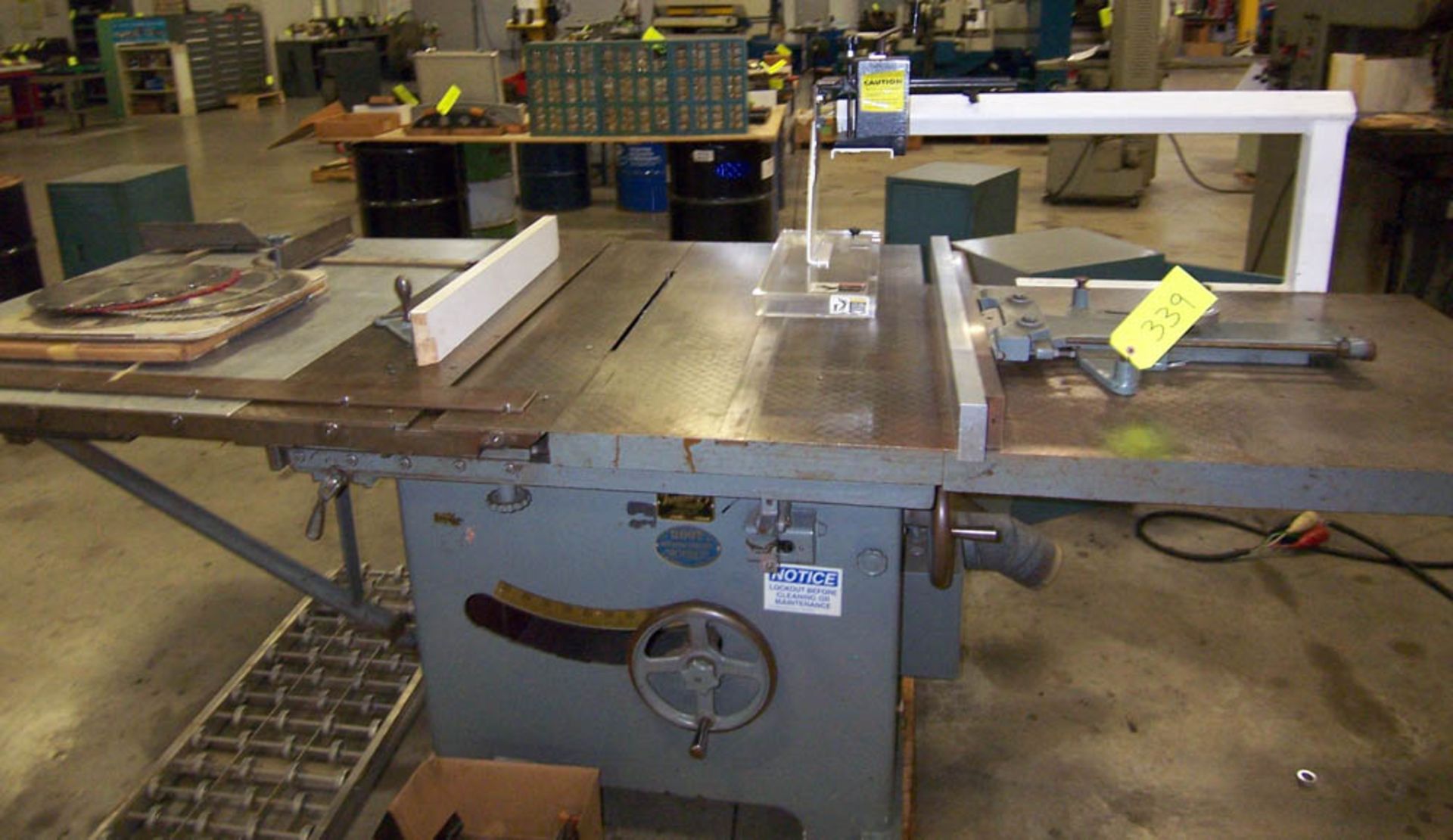 TANNEWITZ MDL. XJS APPROXIMATELY 20" TABLE SAW, WITH ASSORTED SAW BLADES, OVERHEAD GUARD, S/N: