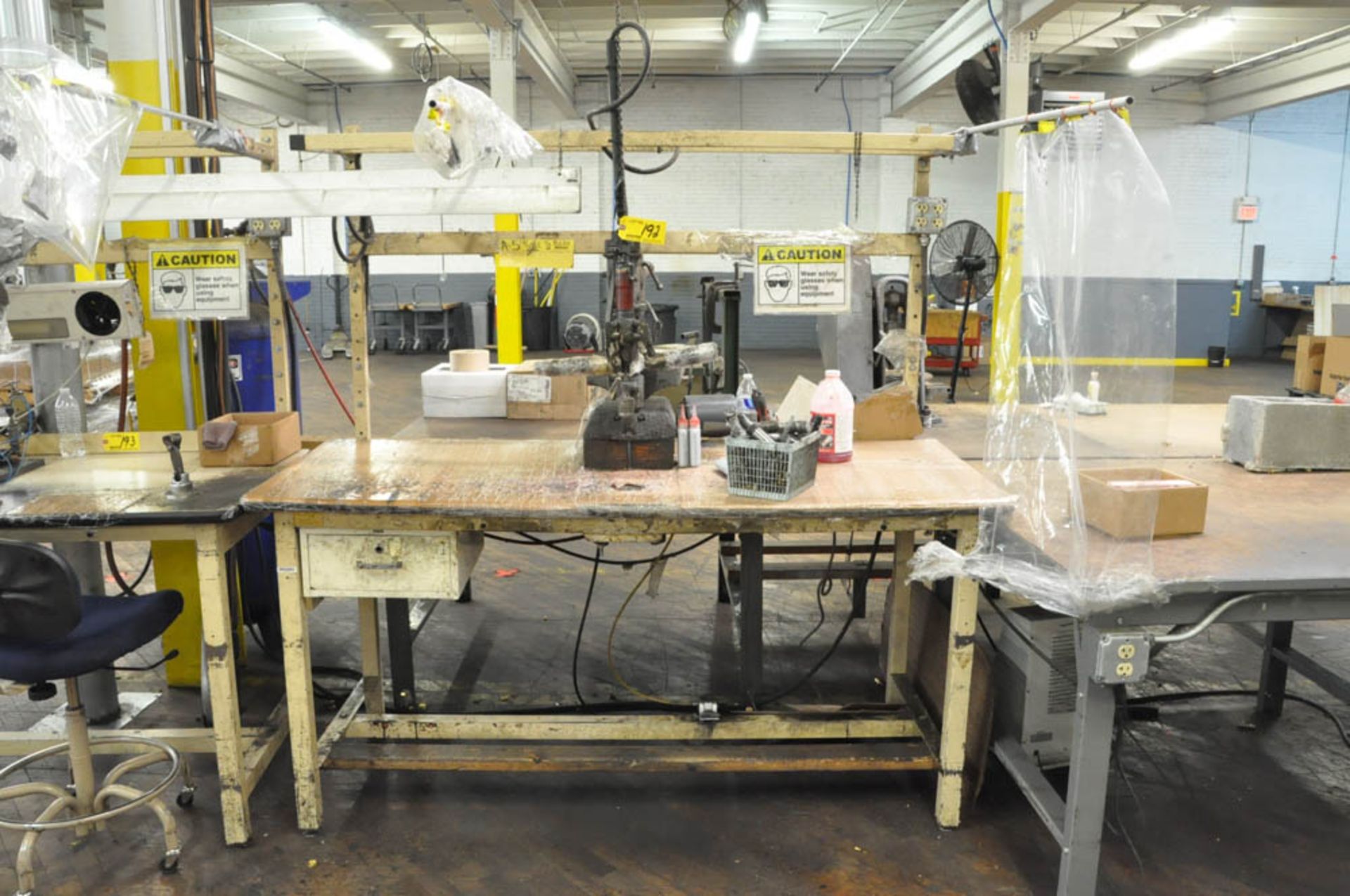 ASSEMBLY STATION WITH RADIAL ARM PNEUMATIC SOCKET DRIVER, AND BENCH