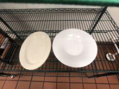 Assorted Ceramic and Plastic Plates and Saucers