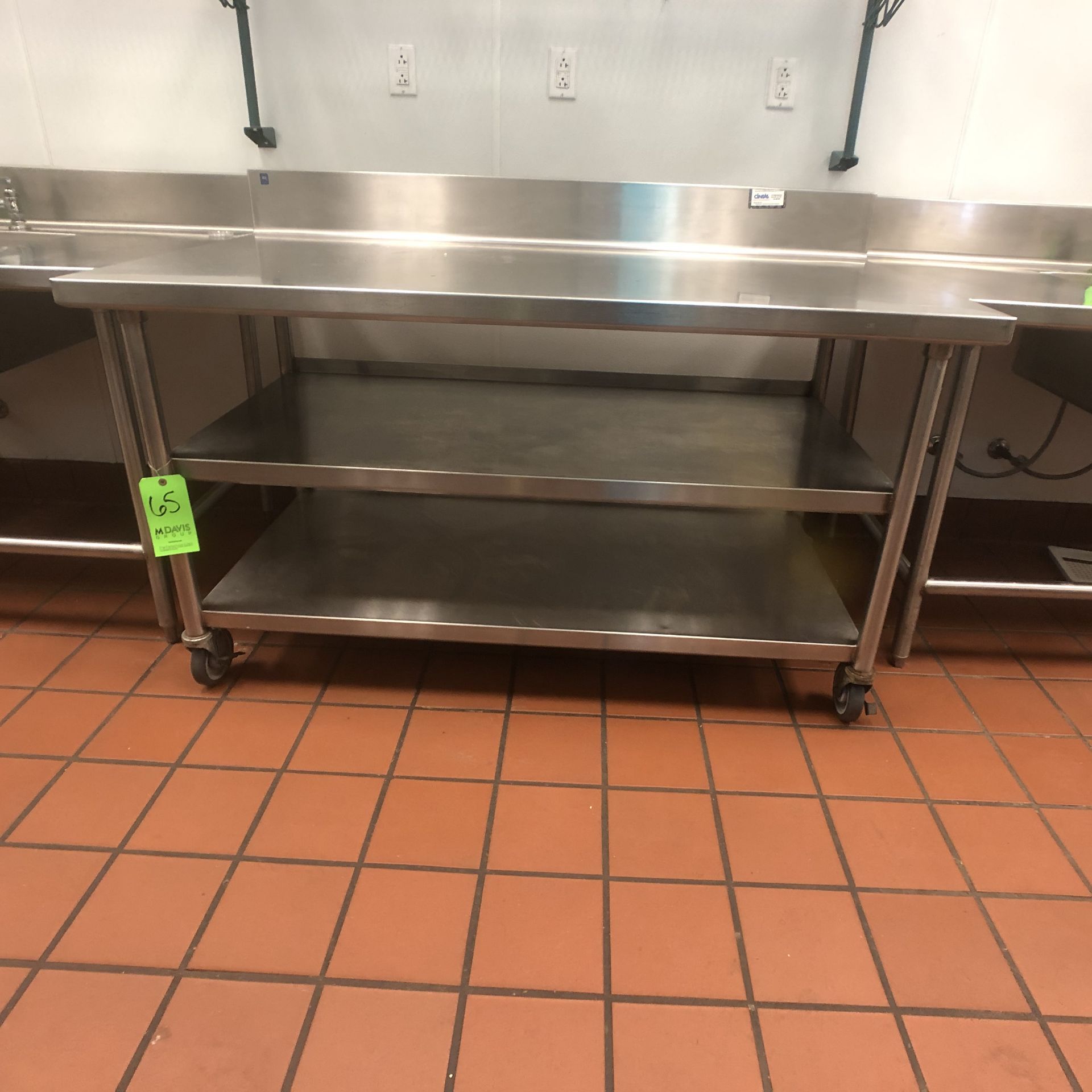 S/S Table with Racks and S/S Backsplash, Approx. 60" L x 32" W, Mounted on Casters