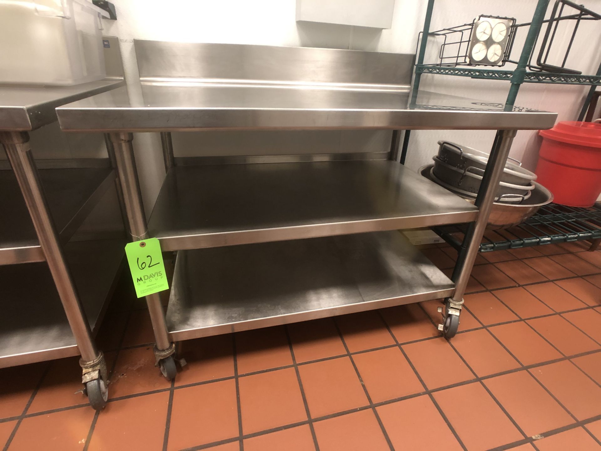 S/S Table with Racks and S/S Backsplash, Approx. 48" L x 32" W, Mounted on Casters