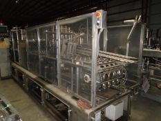 Osgood 4 lane cup filler, model 4400, s/n 198481, 79mm = 2 7/8” cup diameter,