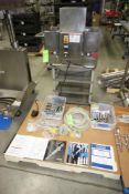 Filamatic Liquid Filling Machine, M/N DAB-8-4, S/N 021238, with Foot Pedal, with Spare Parts