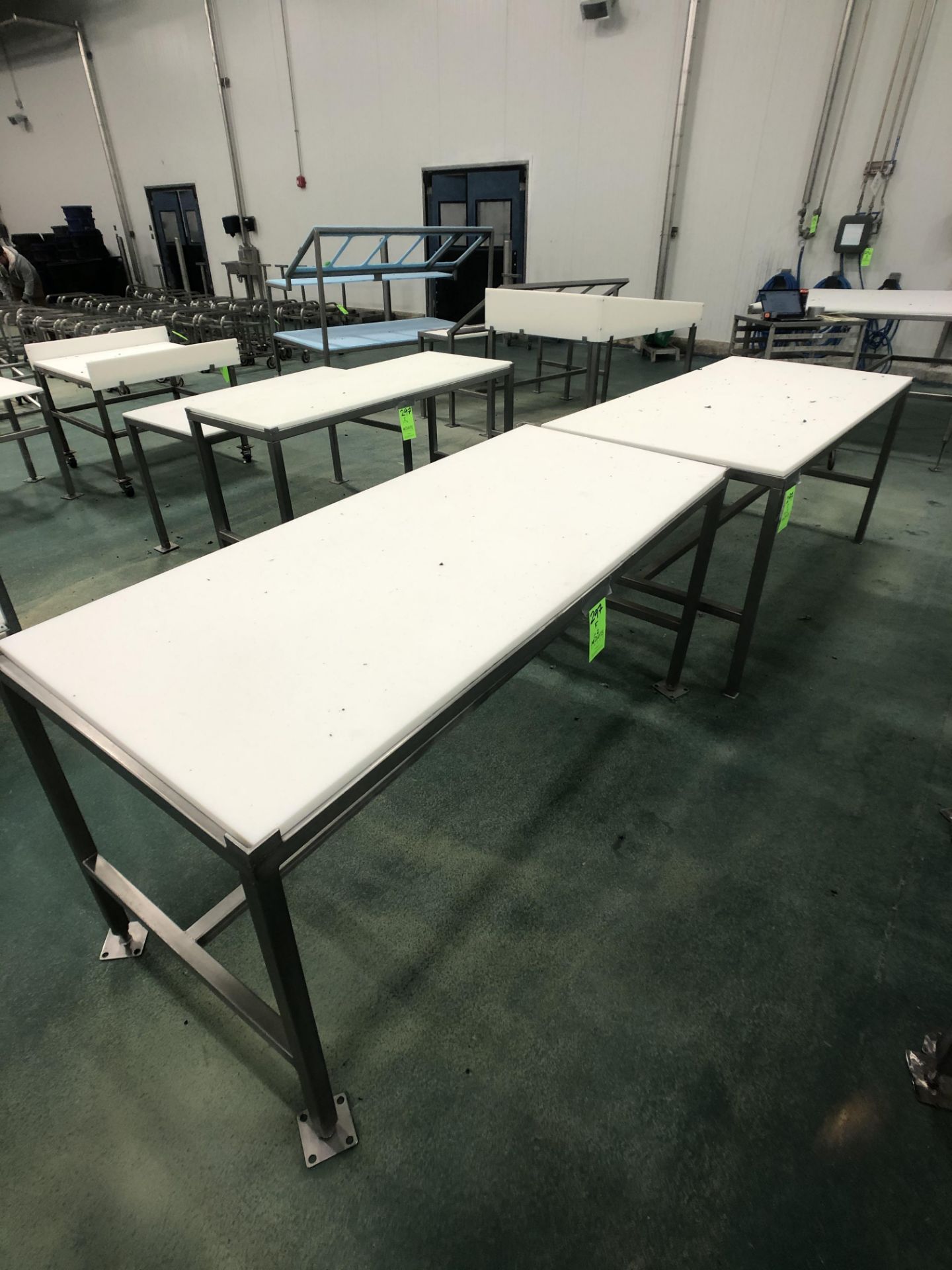 (1) S/S TABLE WITH PLASTIC CUTTING BOARD TOP APPX L72'' X W36'' (1) S/S TABLE WITH PLASTIC CUTTING