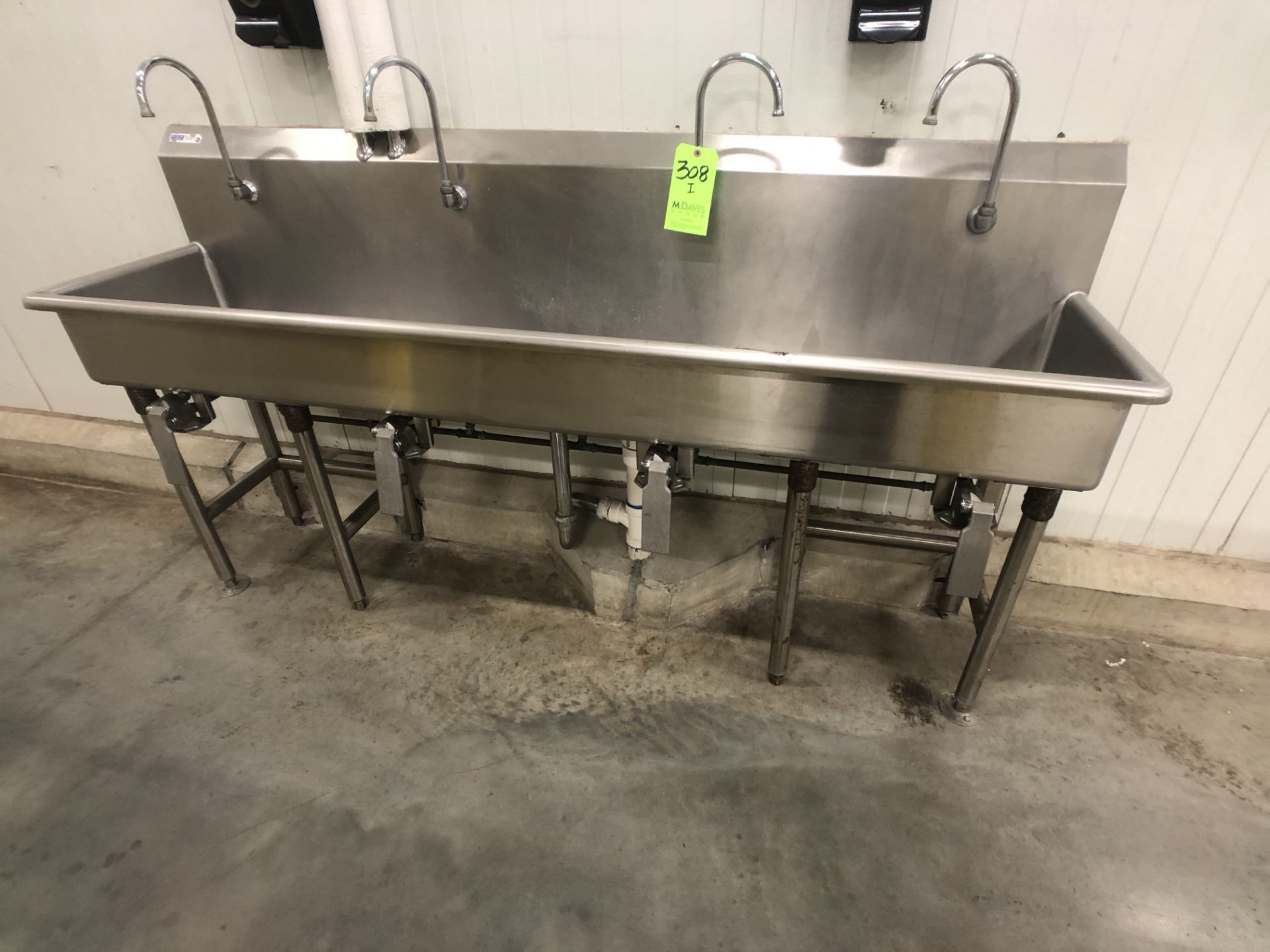 S/S SINK W/ FOUR FAUCETS AND KNEE PEDDLES