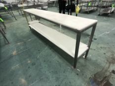 S/S TABLE WITH CUTTING BOARD TOP AND BOTTOM SHELF APPX DIM. LWH'' 112-1/2 X 17-1/2 X 34