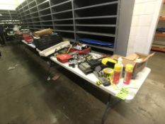 ASSORTED TOOLS AND SUPPLIES ON TABLES IN MACHINE SHOP