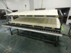 S/S PACK-OFF TABLE WITH ROLLER CONVEYOR, PORTABLE/MOUNTED ON CASTERS, UMHW CUTTING BOARD TOP AND