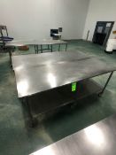 S/S TABLE ON CASTERS APPX 84" L X 30 W''