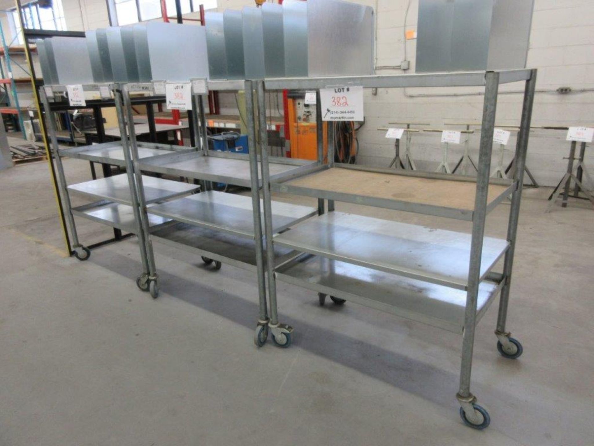 Metal carts on wheels 24"d x 43"w x 50"h - Image 2 of 2