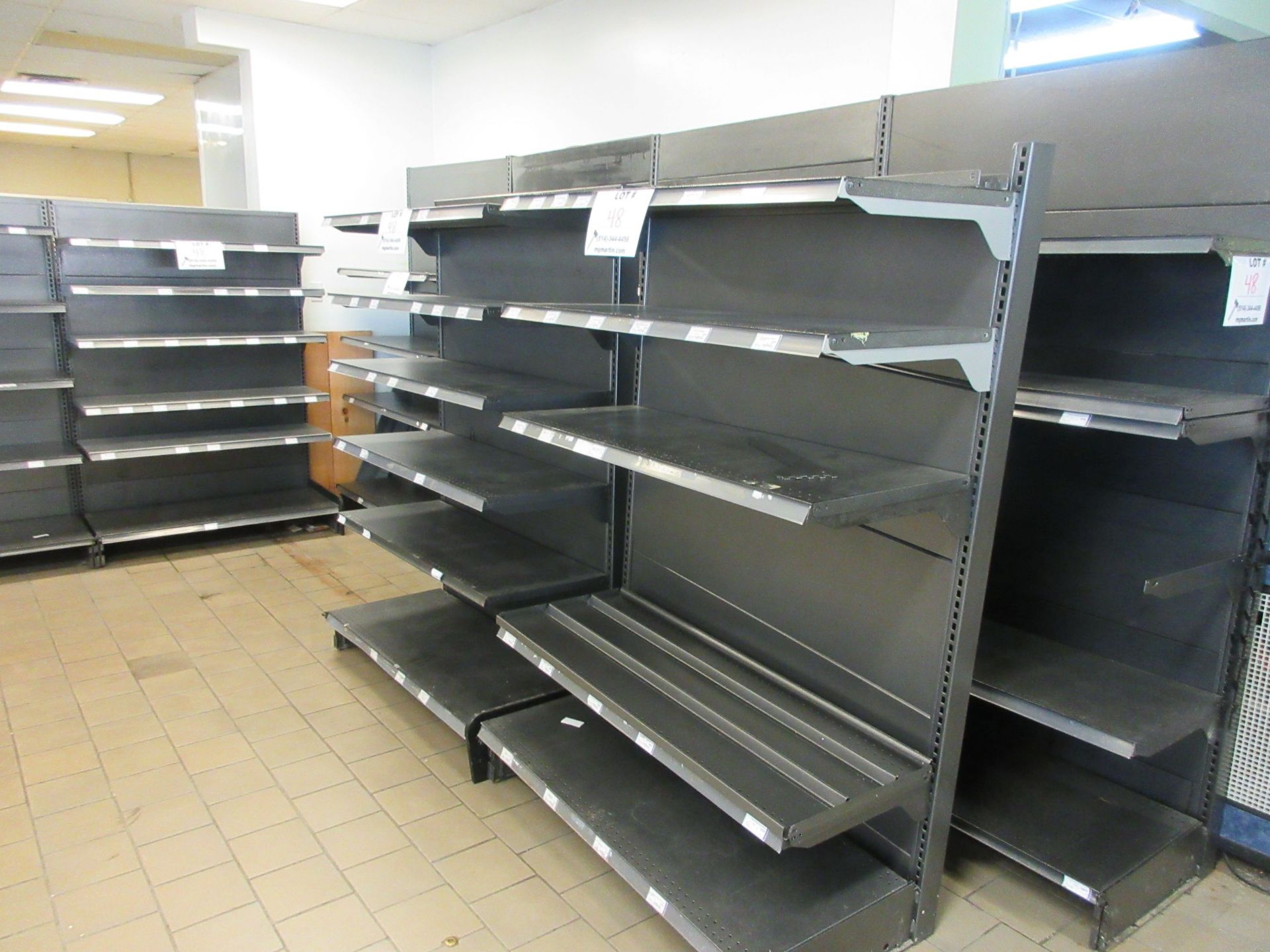 Sections display shelving unit aprox. 48" w x 21"d x 71"h, 83"h (8)