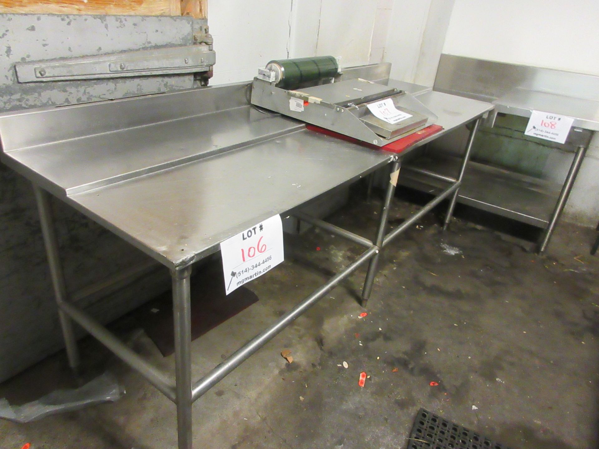 Stainless steel table aprox. 8ft w x 30"d x 34"h