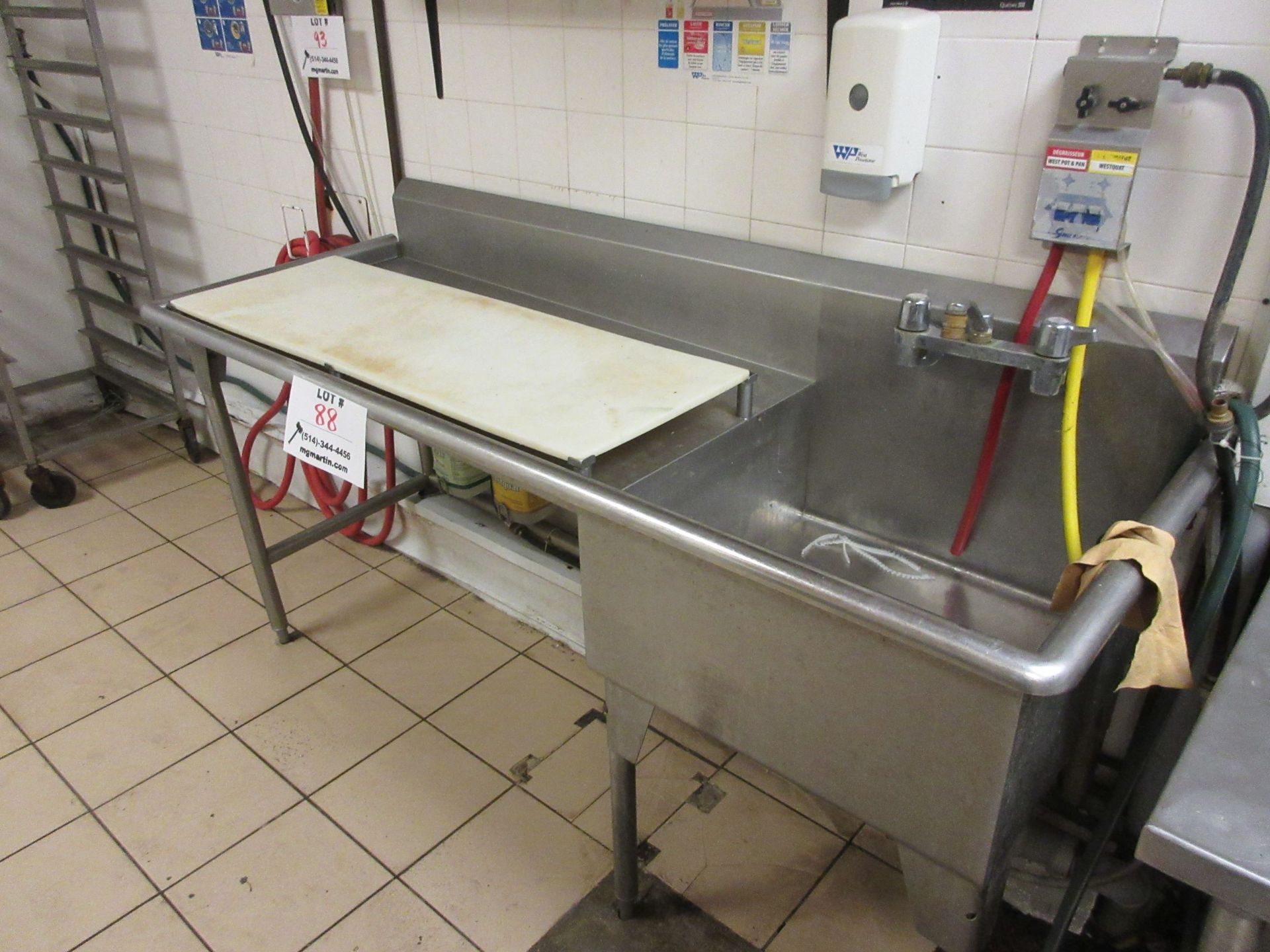 Stainless steel sink w/t cutting board and faucet aprox. 75"w x 27"d x 3ft h - Image 2 of 2