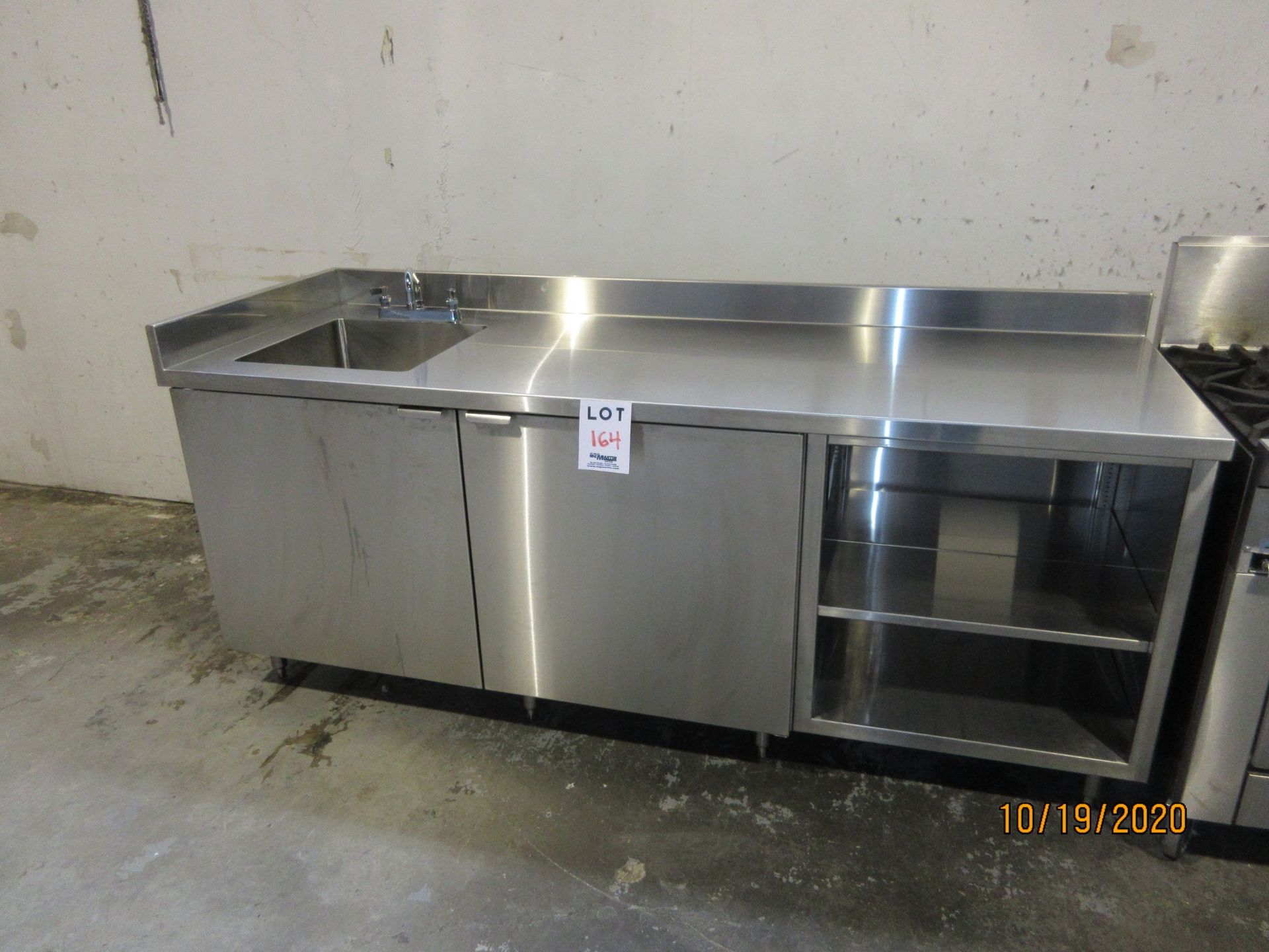 (2) door s/s table w/ sink (approx. 86"w x 30"d x 40" h)