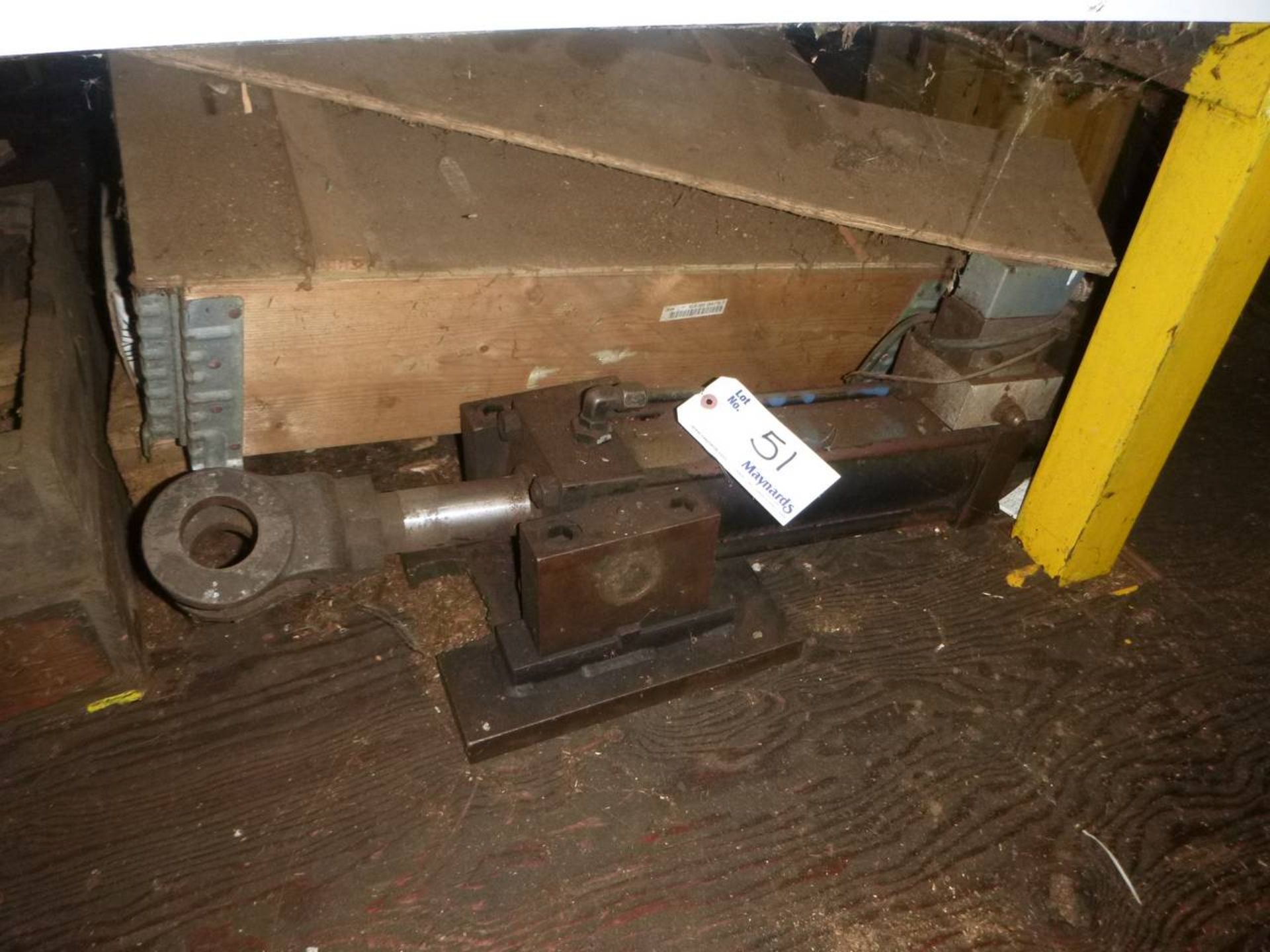 Cylinder and parts on floor