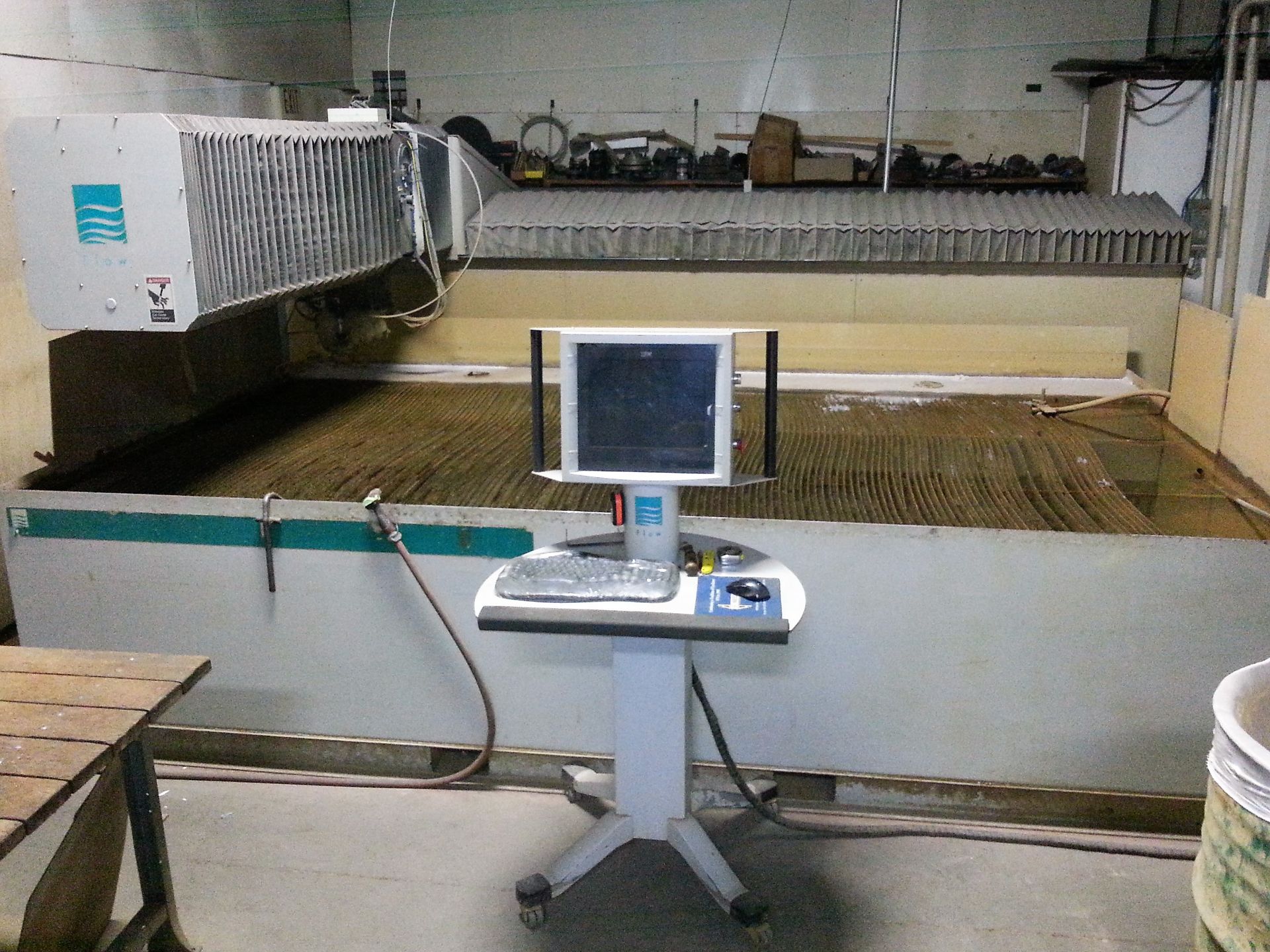 6' X 12' Flow IFB6012 Waterjet , 30 HP Hyplex pump, 3940 hours, dynamic head, 2004 (Milford, CT)