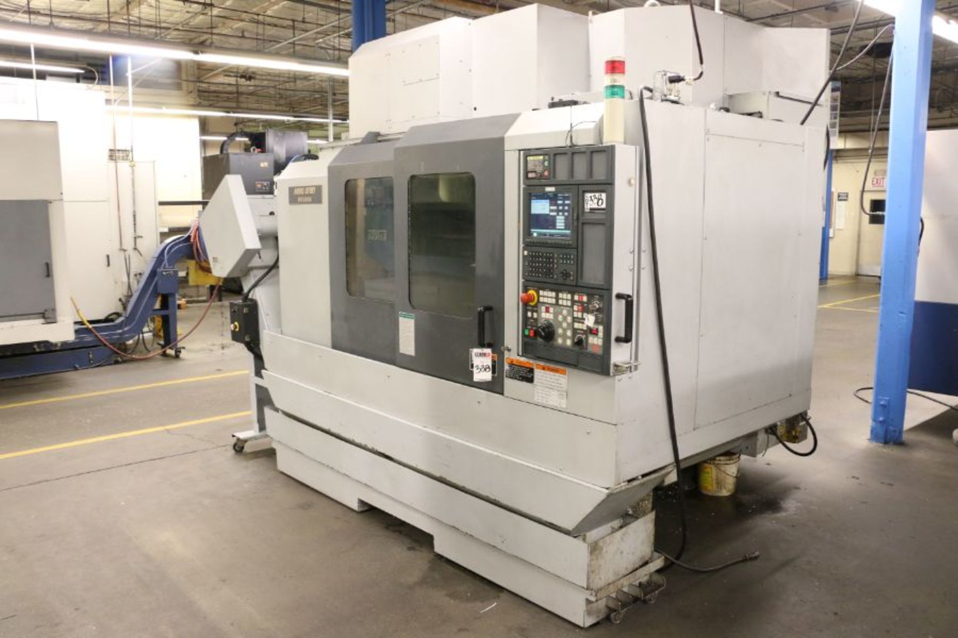 Mori-Seiki NV5000B/40, MSG-501 Control, 40” x 20” x 20”, 14K RPM, 30 ATC, CTS, 30HP, New 2003 - Image 3 of 13