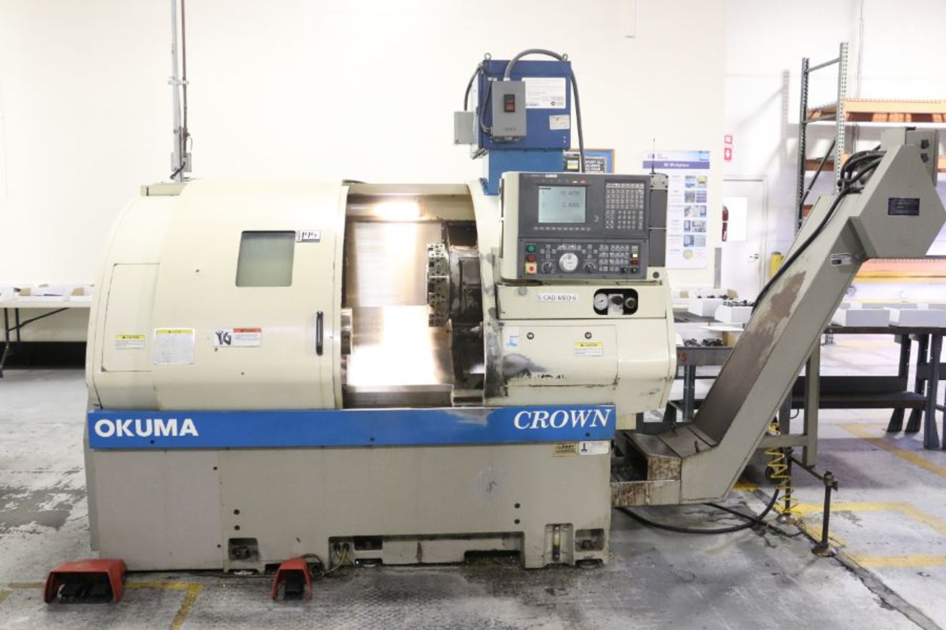 Okuma Crown 762S-SB, OSP-700 control,10.6 turning dia., 19.7" center, 2.4" spindle bore, 12 HP, 4, - Image 4 of 15