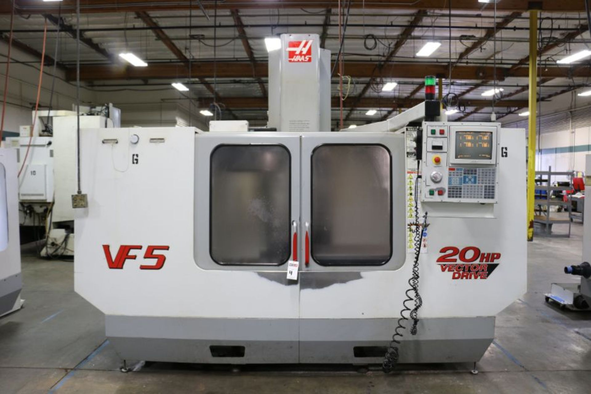 Haas VF-5, 50” x 26” x 25” Travels, 20 Position Tool Carousel, CT-40 Taper, s/n 19337, New 2000