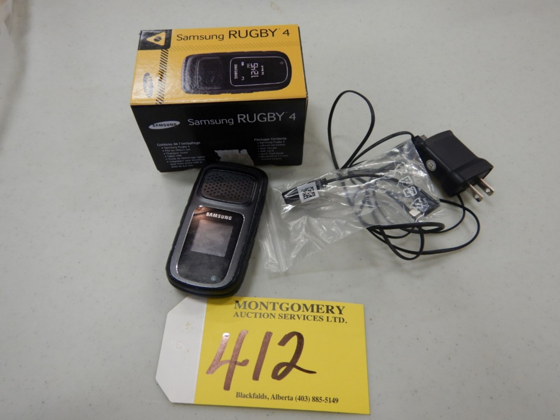 SAMSUNG RUGBY 4 FLIP CELL PHONE C/W CHARGER