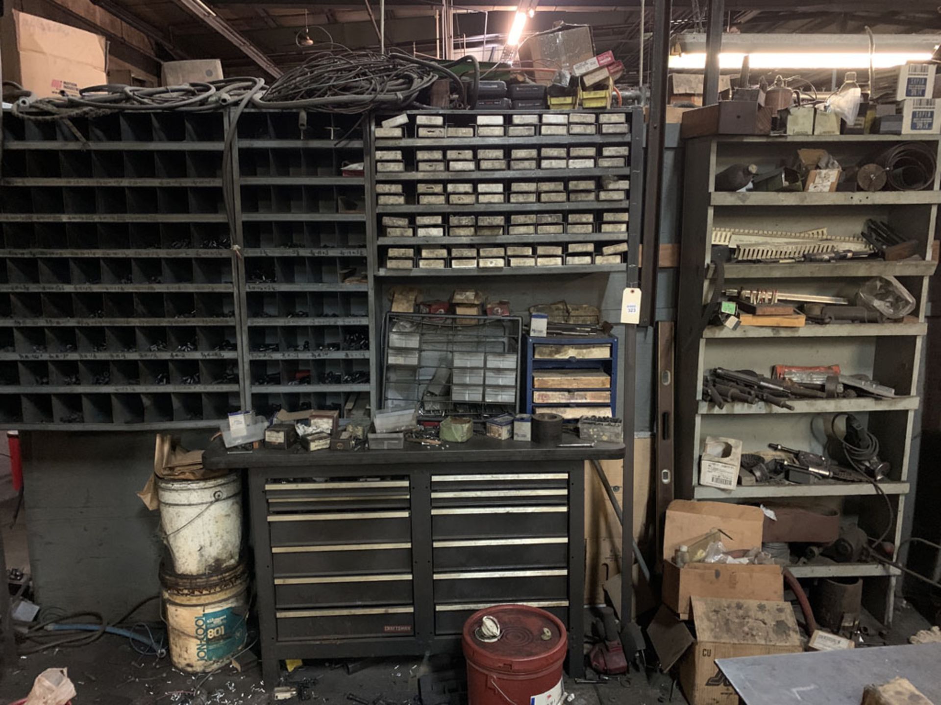 Contents of shelves, plus parts bins plus work bench drawers as shown