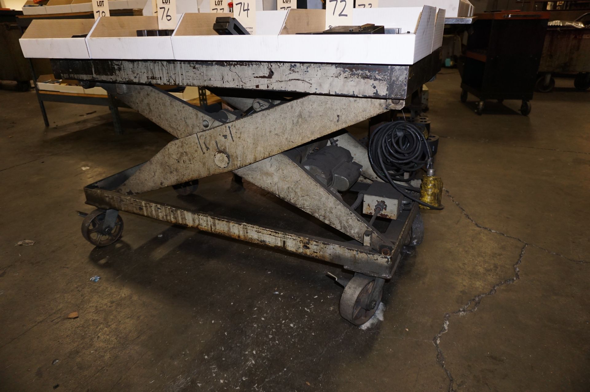 LOT TO INCLUDE: (1) 4000 LB CAP HYDRAULIC LIFT MODEL L9436, S/N 50250A, (1) STEEL WORK TABLE, - Image 2 of 6