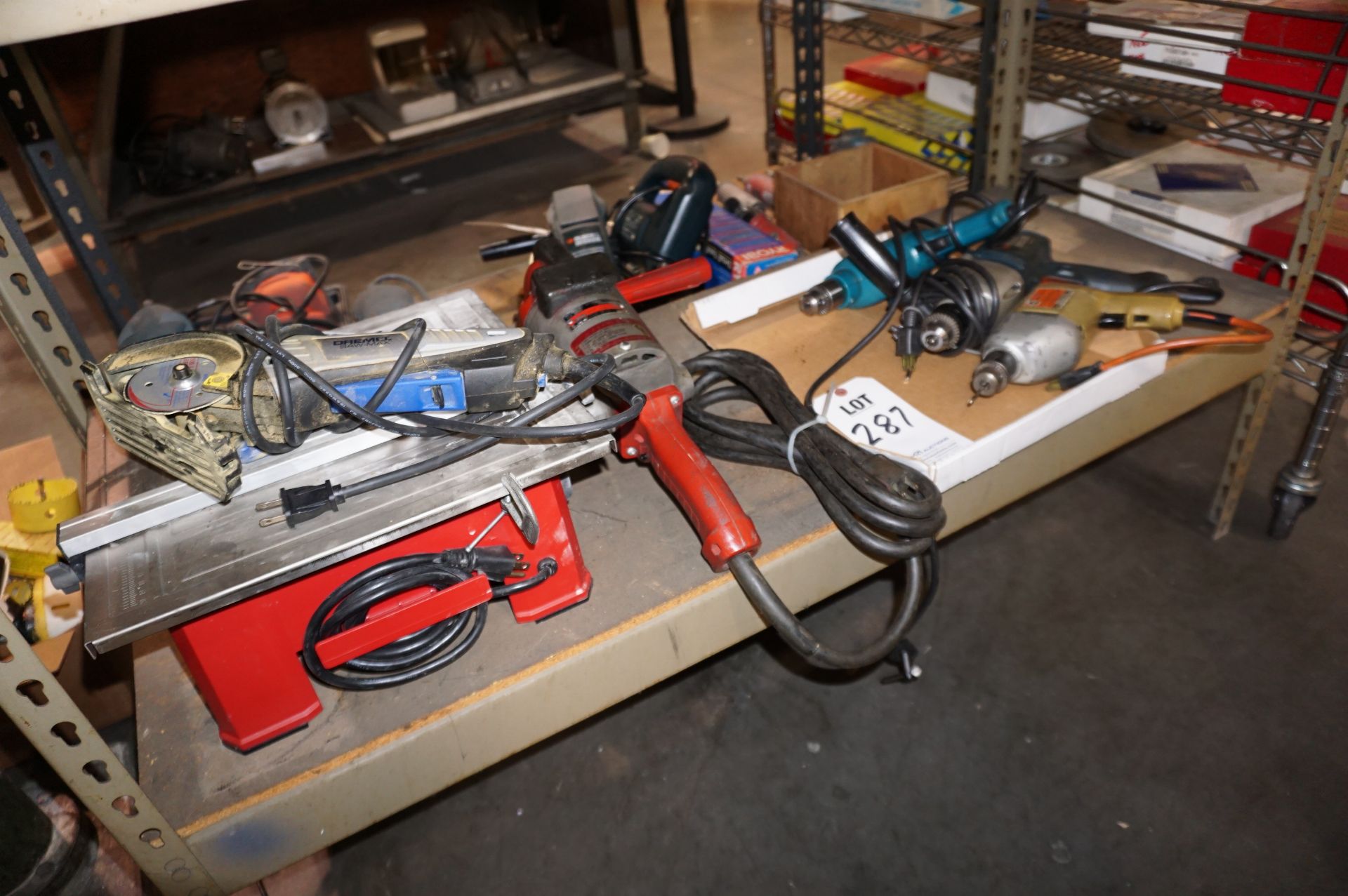 POWER TOOL LOT TO INCLUDE: (1) 7" SKILSAW WET TILE SAW, MODEL 3540, (1) MILWAUKEE GRINDER, CAT NO