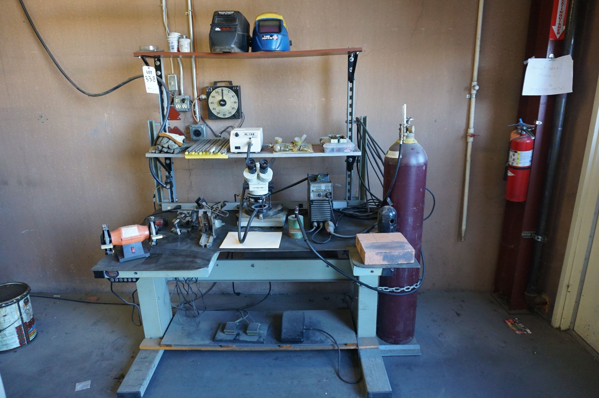 WELDING STATION LOT TO INCLUDE: (1) ADJUSTABLE ELEVATING STEEL WELD TABLE, (1) 5" BENCH GRINDER,