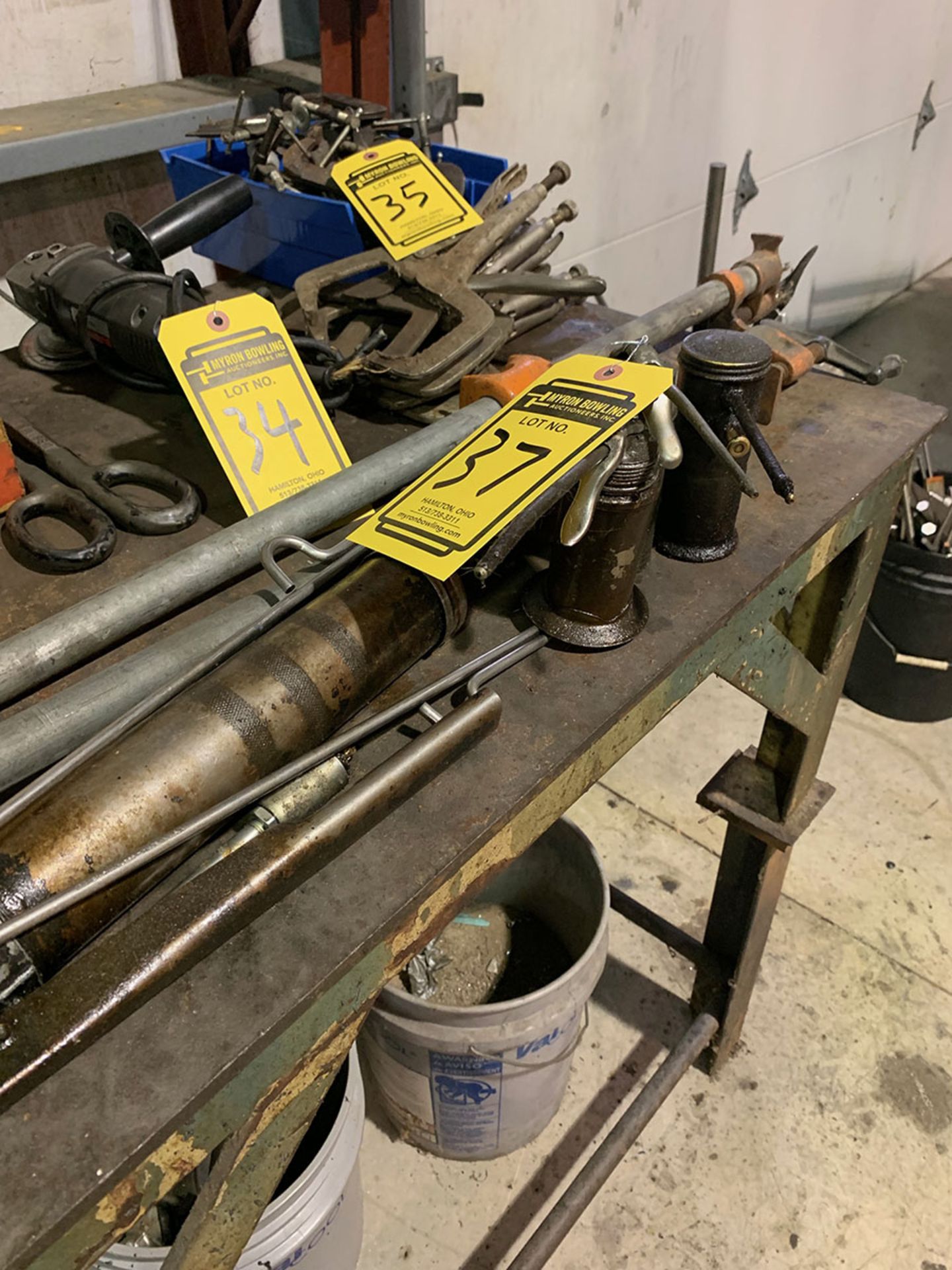 ASSORTED LUBRICANT CANS AND GREASE GUN