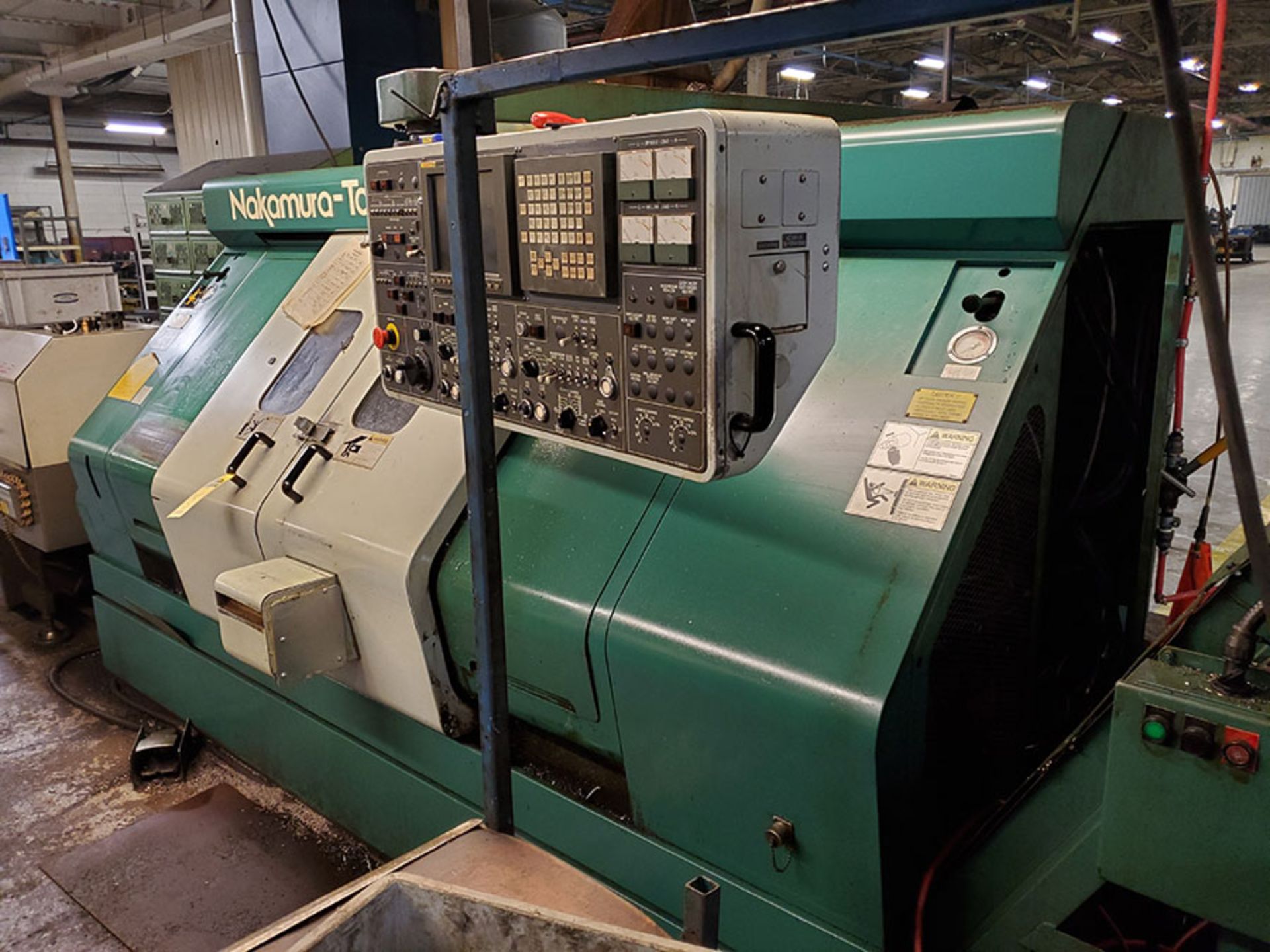 NAKAMURA-TOME TW-10 HORIZONTAL TURNING CENTER, FANUC SE CNC DRO CONTROL, DUAL TURRET SPINDLES, 12- - Image 5 of 23