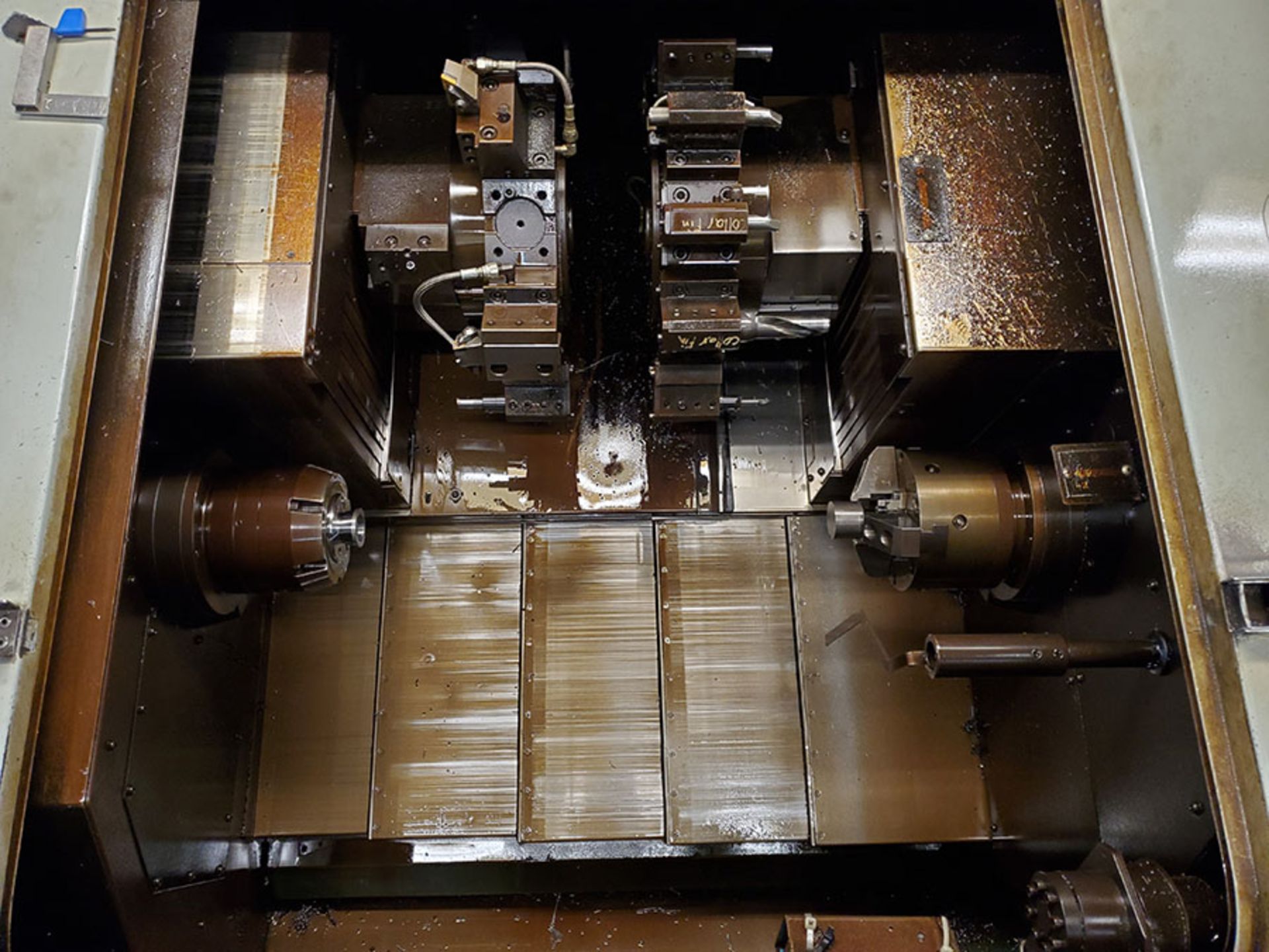 NAKAMURA-TOME TW-10 HORIZONTAL TURNING CENTER, FANUC SE CNC DRO CONTROL, DUAL TURRET SPINDLES, 12- - Image 9 of 23