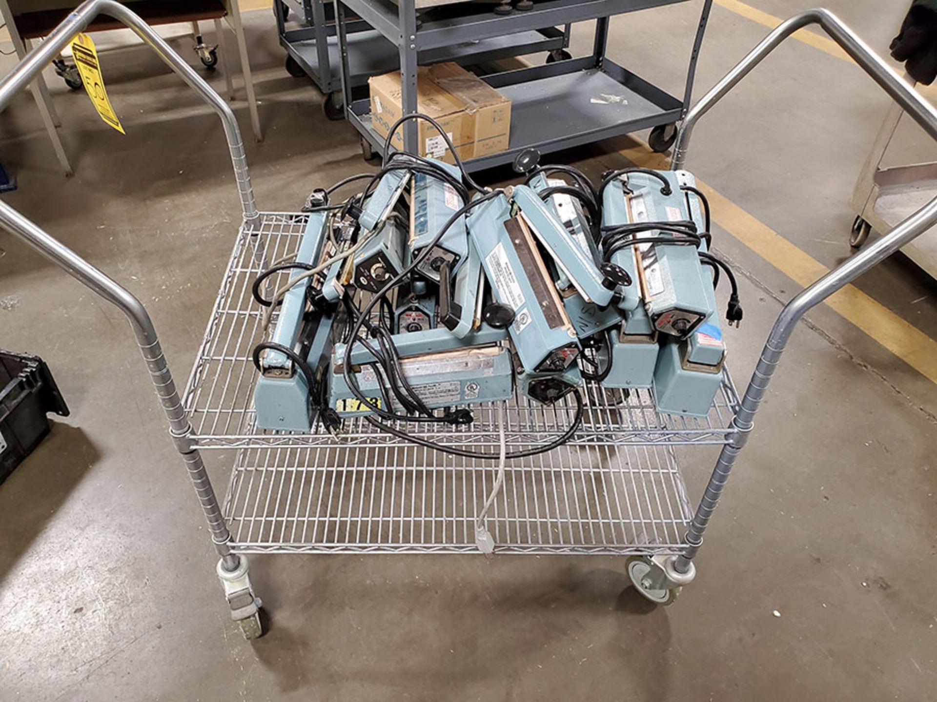 LOT OF MIDWEST PACIFIC IMPULSE HEAT SEALERS ON ROLLING METRO CART