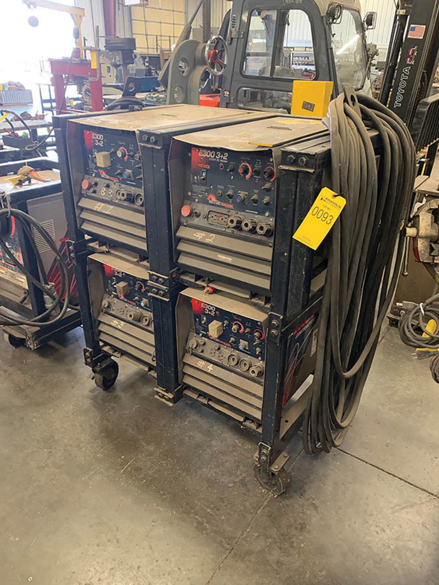 LINCOLN RED-D-ARC E300 3+2 WELDER CART WITH (4) E300 3+2 WELDERS, S/N'S 0007407, 0006201, 0003067,