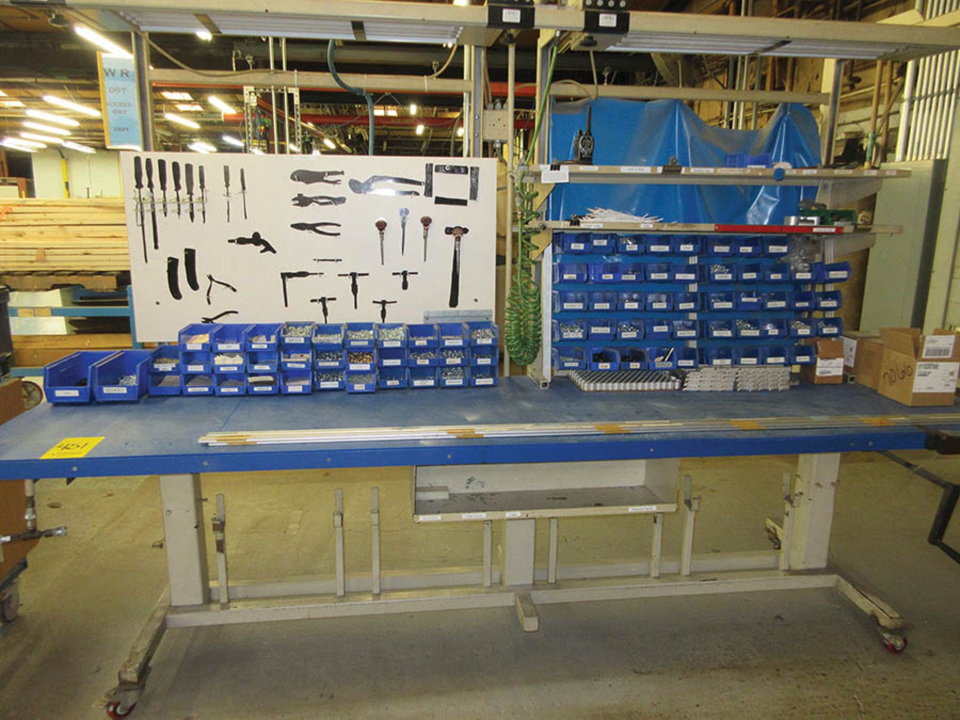 ACCESSORY DEPT. WORKSTATION: LAYOUT TABLE, FEED TABLE, CART W/ TEST FIXTURES, AND HARDWARE