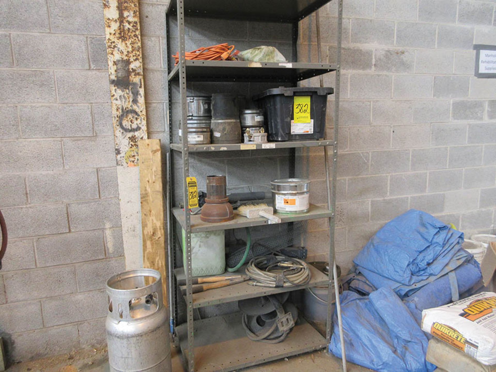 (2) SHELF UNITS W/ COUPLINGS, HANGERS, WORKBENCH W/ GARDEN HOSE, AIR HOSE, AND ASSORTED PRESSURE - Image 2 of 3