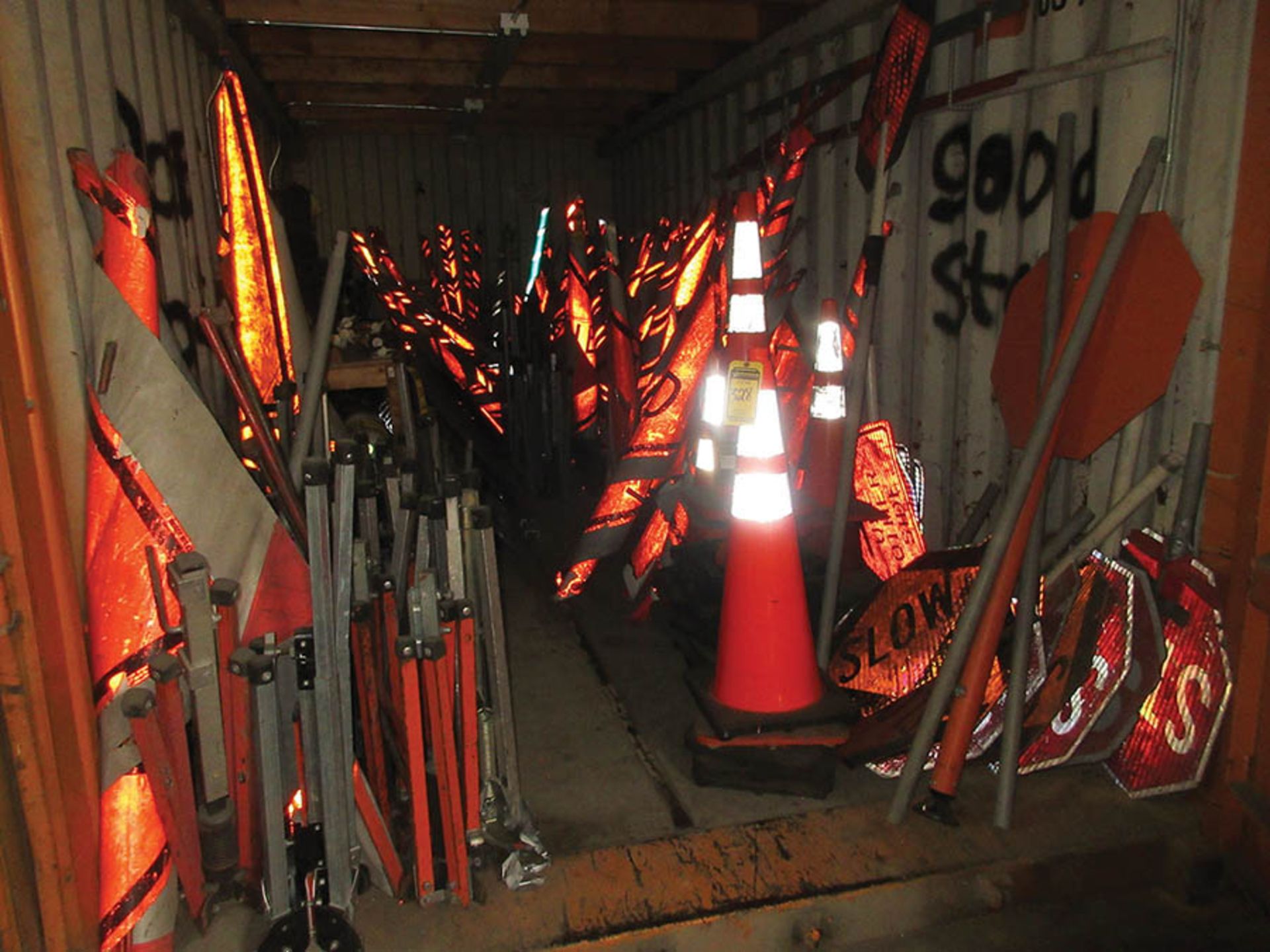 CONTENTS INSIDE & ON TOP OF CONTAINER: BARREL BASES, CONES, HAND-HELD SIGNS, COMPACT STANDS, BANNERS