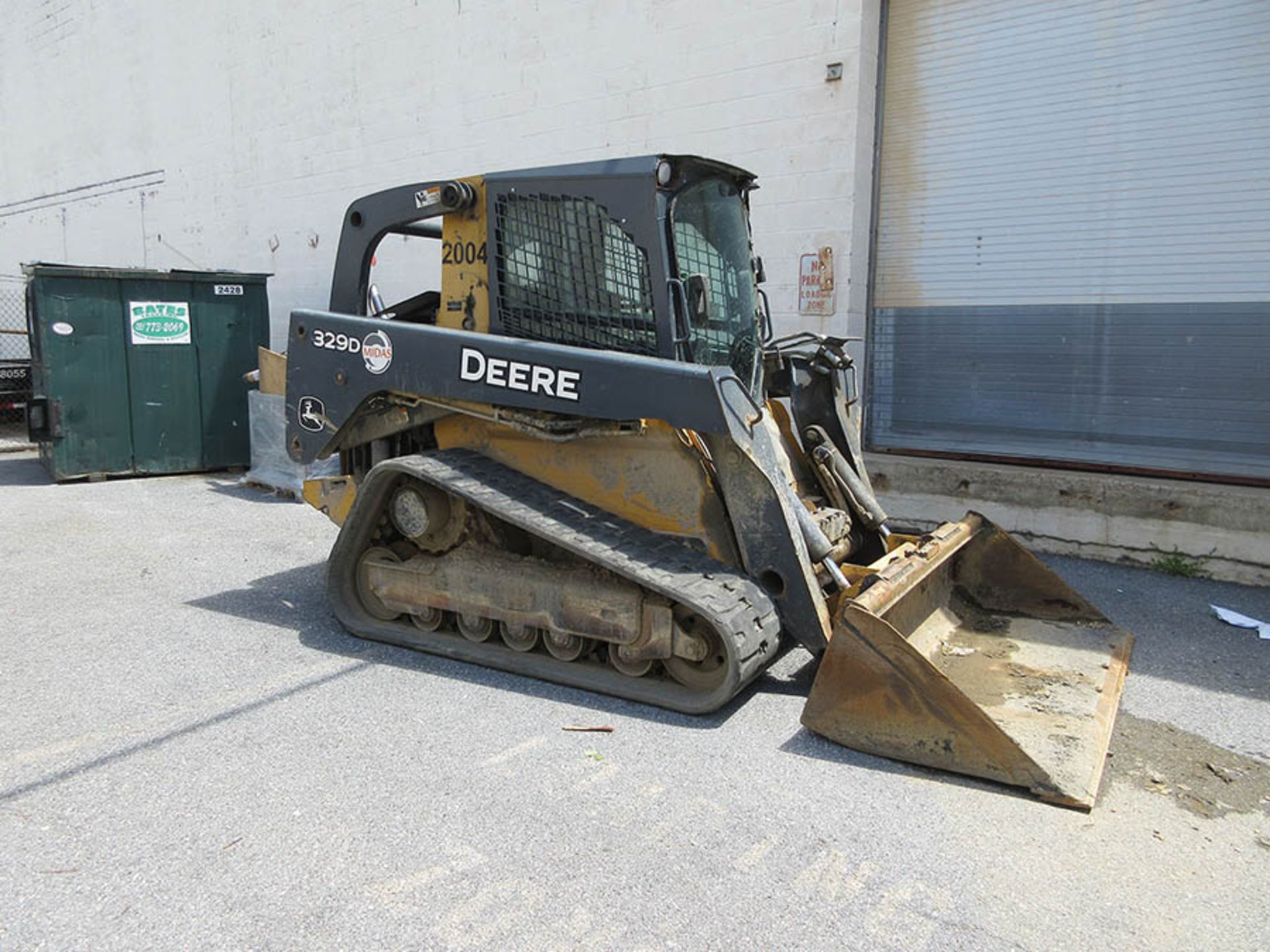 2011 JOHN DEERE 329D SKID STEER, JOYSTICK CONTROLS, AM/FM RADIO, 4,393 HOURS, RUBBER TRACKS, RUNS