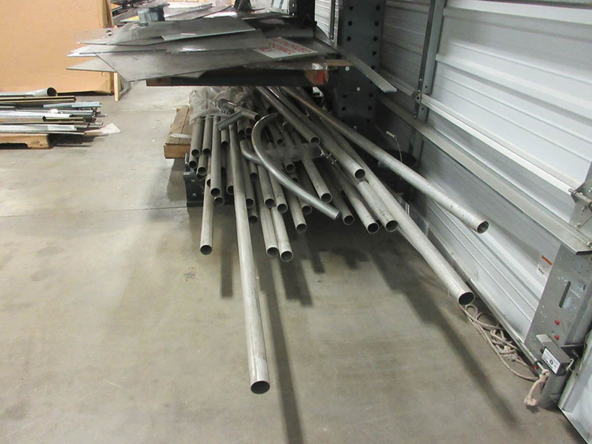 CONTENTS OF CANTILEVER RACK - CONDUIT, DIAMOND PLATE, LEXAN, AND PLYWOOD - Image 2 of 3