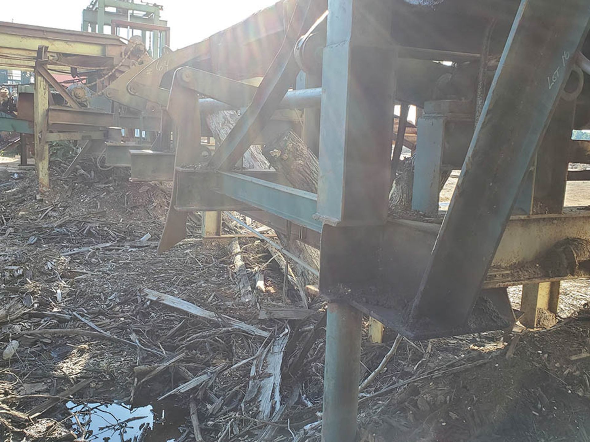 INFEED LOG TROUGH CONVEYOR INTO MILL STRAND SINGLE OF H-82 CHAIN, 4 TONG LOG PICKER ONTO 3 STRAND - Image 16 of 19