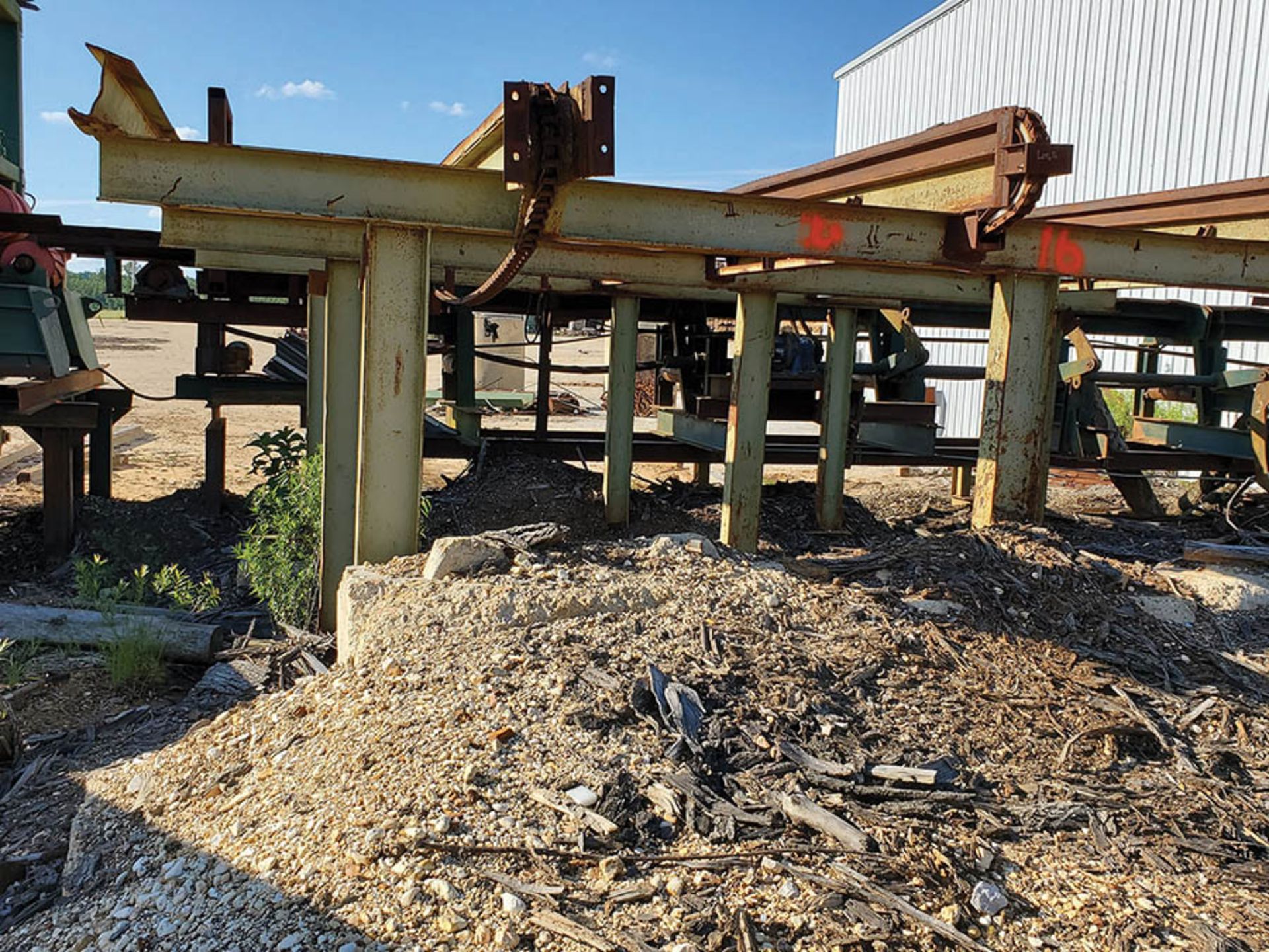 INFEED LOG TROUGH CONVEYOR INTO MILL STRAND SINGLE OF H-82 CHAIN, 4 TONG LOG PICKER ONTO 3 STRAND - Image 19 of 19