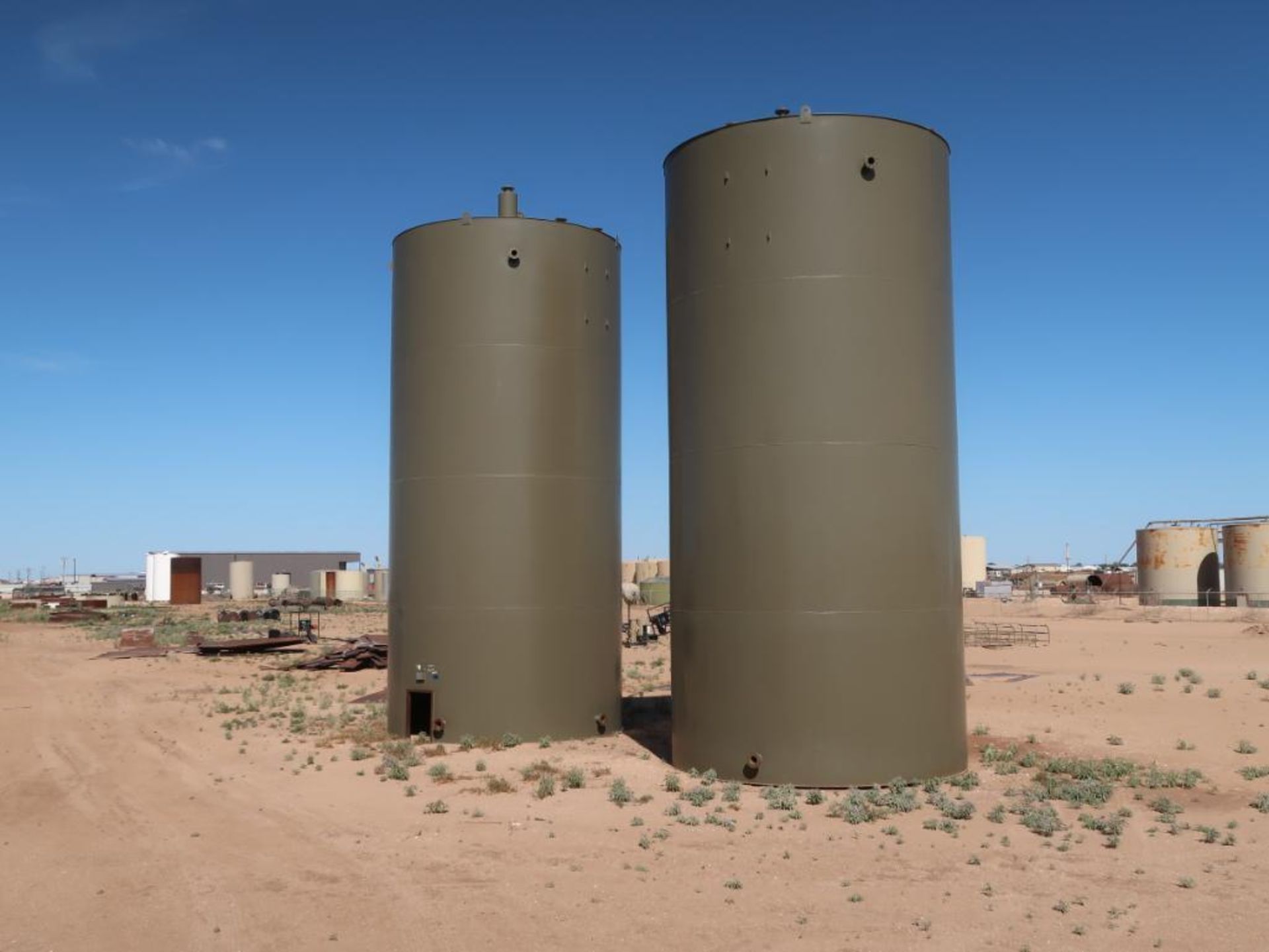 (6) LARGE STEEL TANKS - (2) 1000 BBL, (2) 750 BBL, AND (2) NEW 1000 BBL