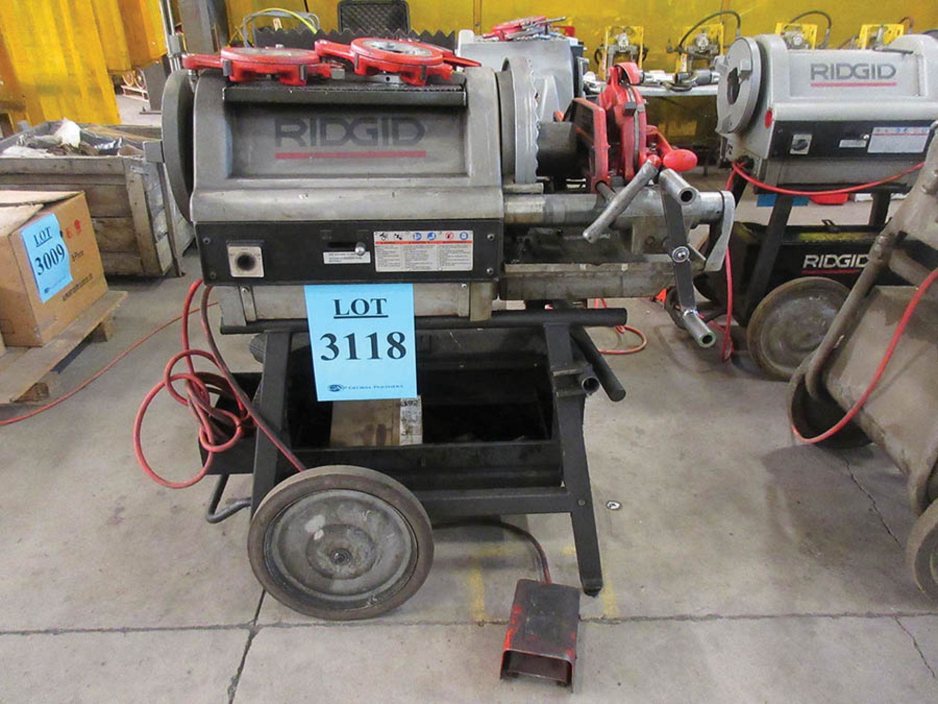 RIDGID 1224 PIPE THREADING MACHINE WITH STAND, PLUS (QTY.2) 1/8'' - 2'' DIE HEADS, AND (QTY.1) 2 1/2