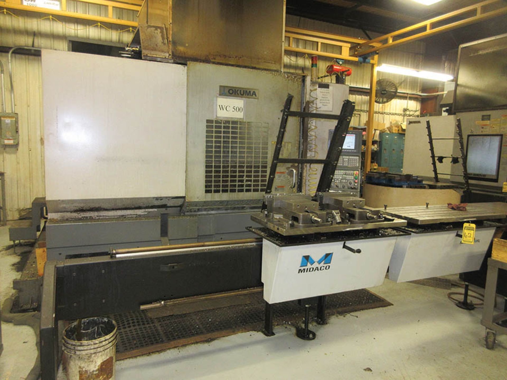 2005 OKUMA MA550VB CNC MACHINING CENTER, QUICK-CHANGE 32-POSITION TOOL CHANGER, CHIP BLASTER, CHIP