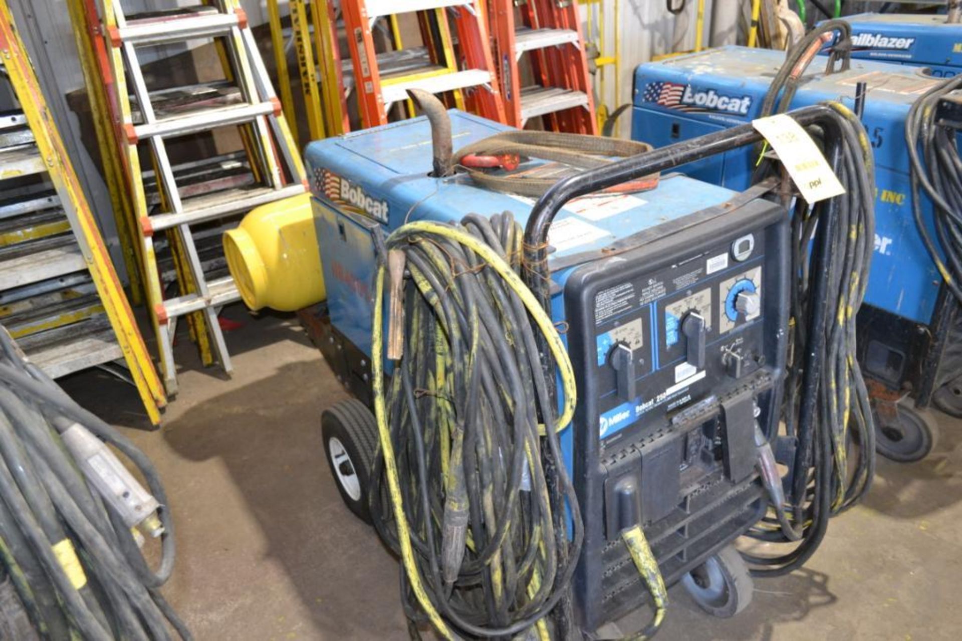 MILLER 250 AMP PORTABLE LP WELDER/GENERATOR MODEL BOBCAT 250; WITH CABLES & CLAMPS (BUILDING #1)