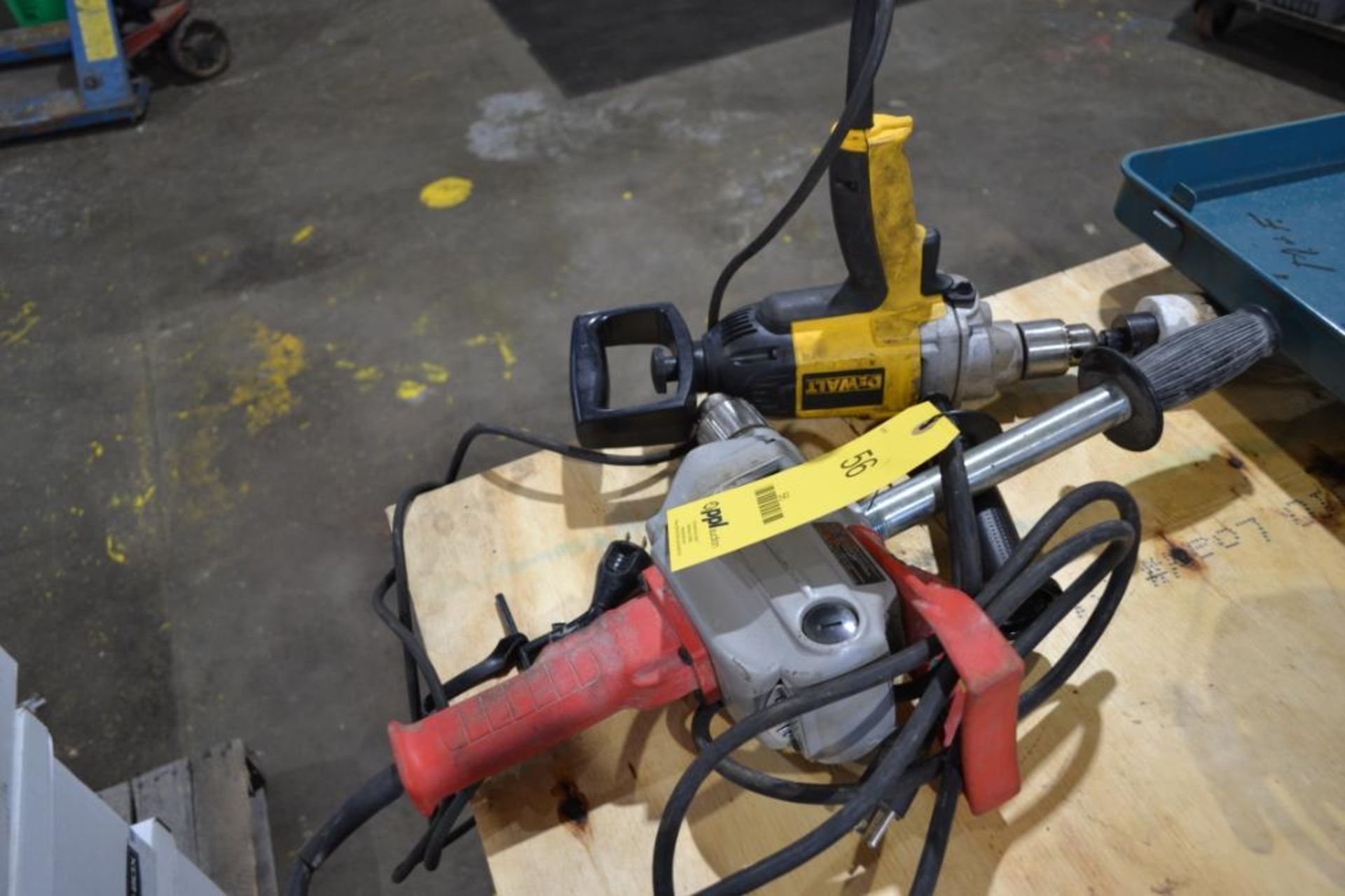 LOT: (1) MILWAUKEE & (1) DEWALT 1/2 IN. ELECTRIC DRILLS (BUILDING #1)