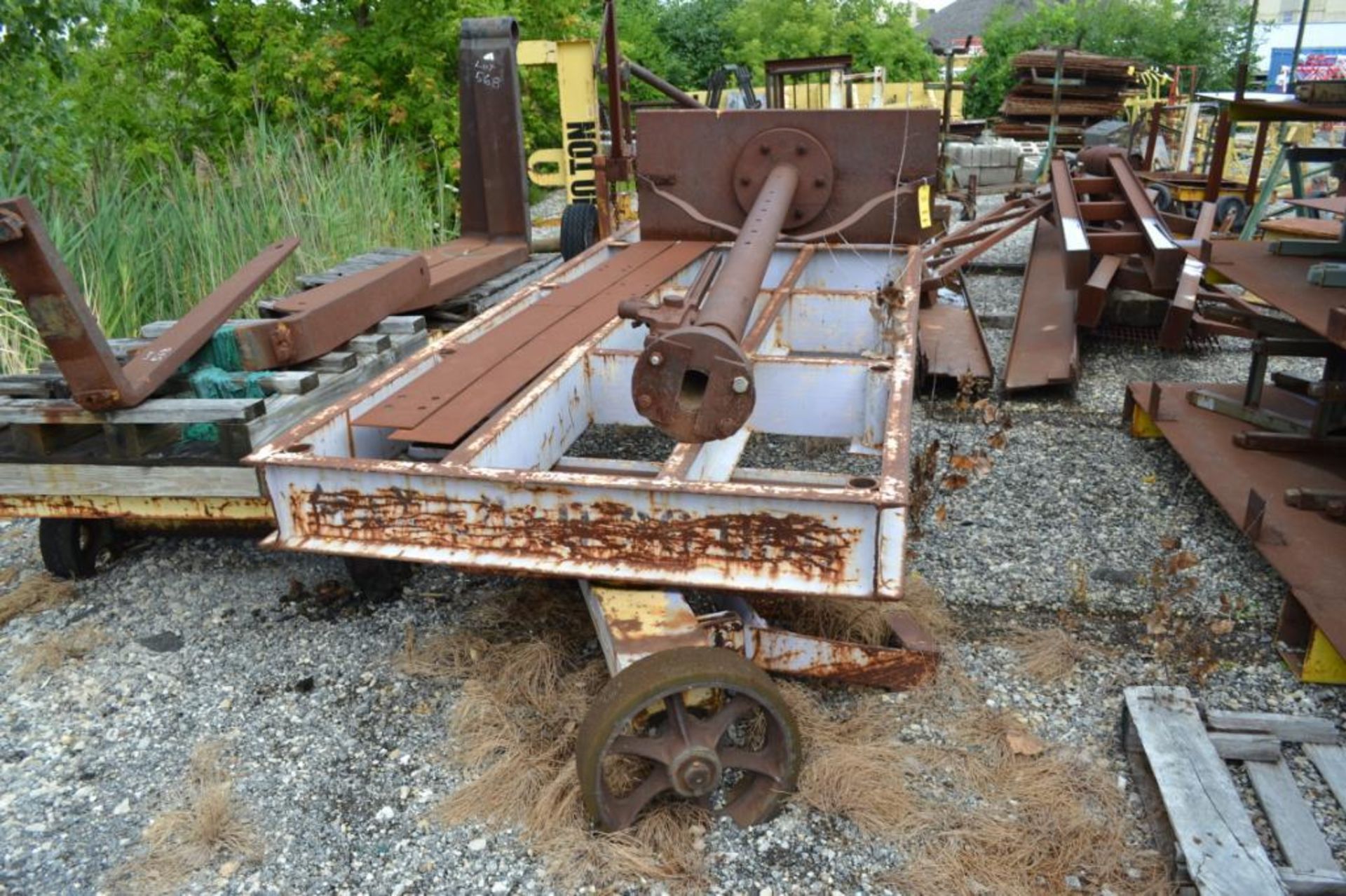 LOT: (2) TOWABLE SOLID WHEEL STEEL CARTS; WITH (2) SETS OF FORKLIFT FORKS - 72 IN. & 42 IN. (