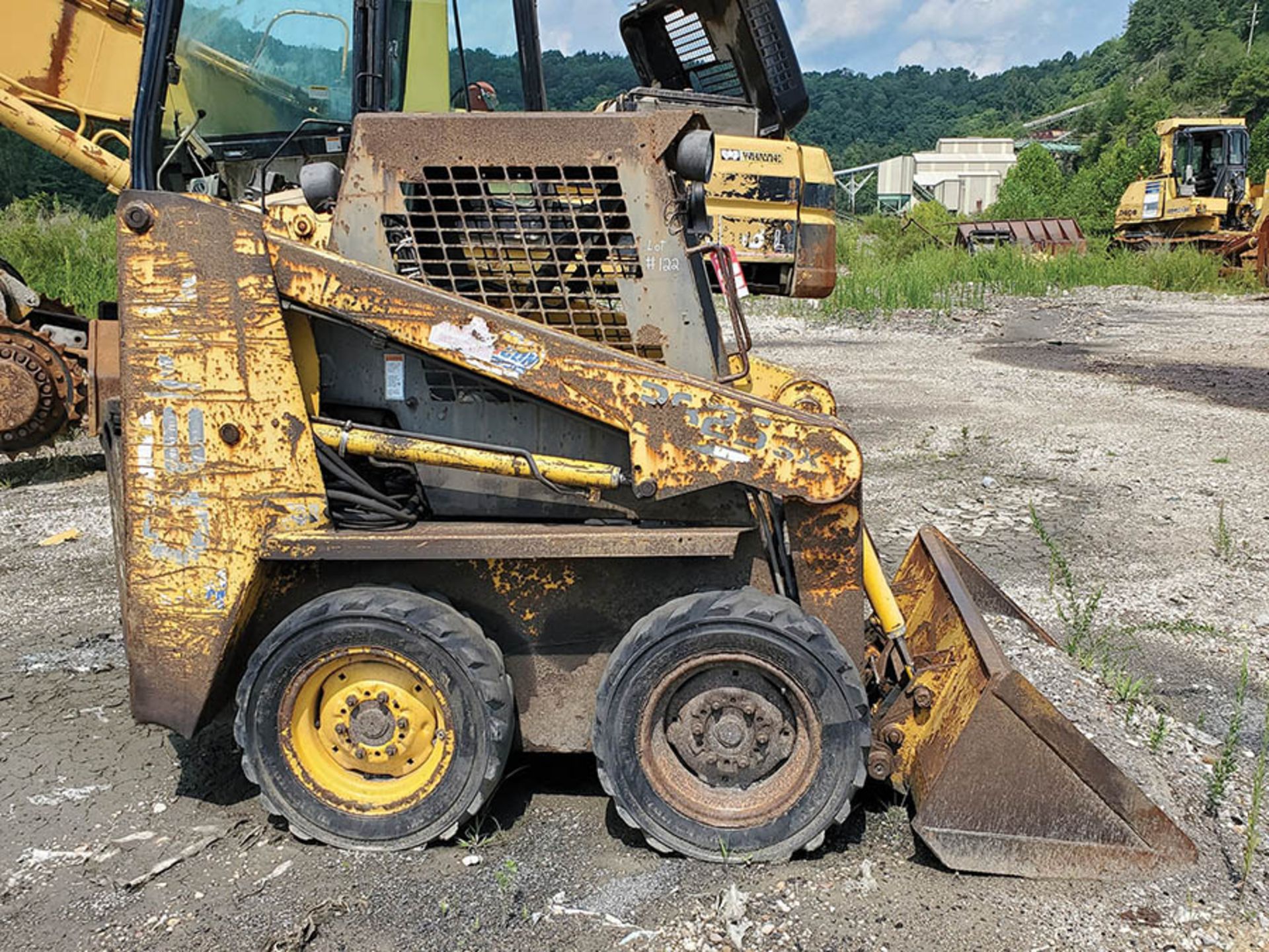 GEIL SKID STEER LOADER, MODEL 3325SX LOCATION: LOWER LEVEL BEECH FORK YARD