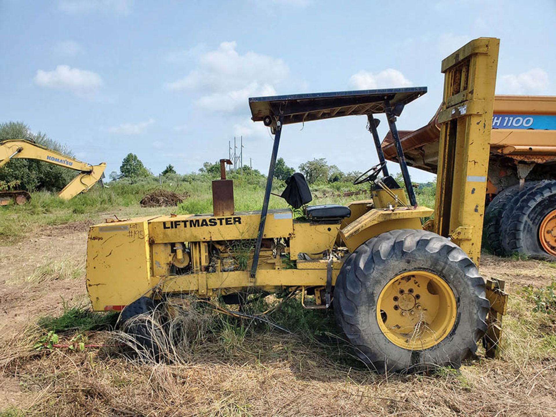 LIFTMASTER OFF-ROAD FORKLIFT, LOCATION: MARCO SHOP BACK FIELD