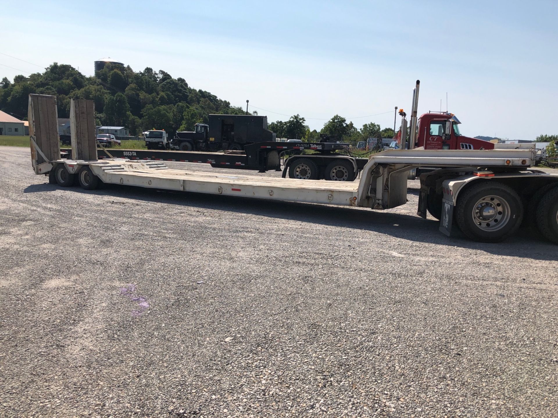 DOUBLE DROP T/A TRAILER WITH HYDRAULIC RAMPS, 25' 9'' DECK, LOCATION: MARCO SHOP