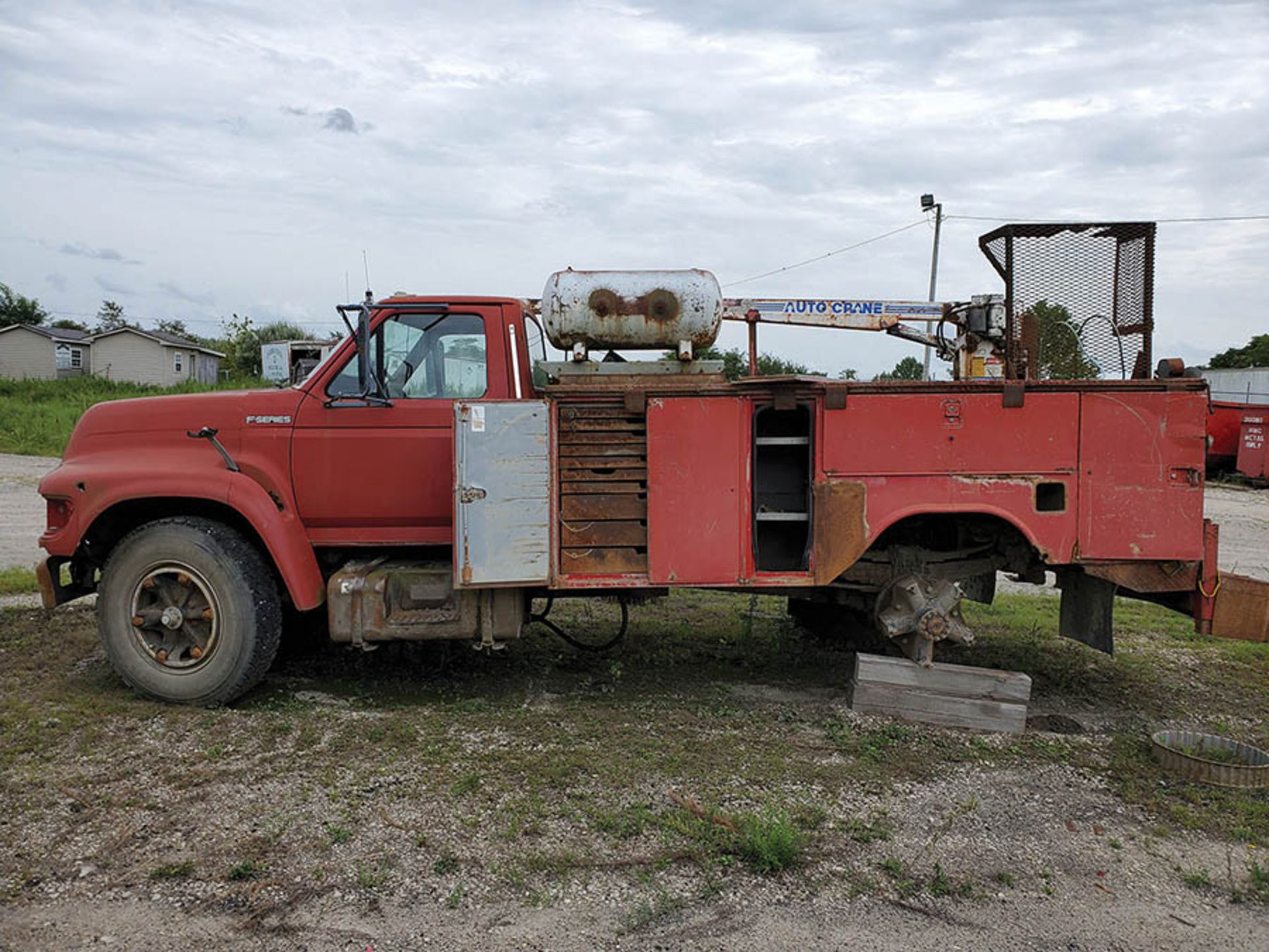 1997 FORD F-SERIES, DIESEL, MANUAL TRANS, WITH AUTO CRANE, VIN 1FDNF80C6WVA21598, LOCATION: MARCO